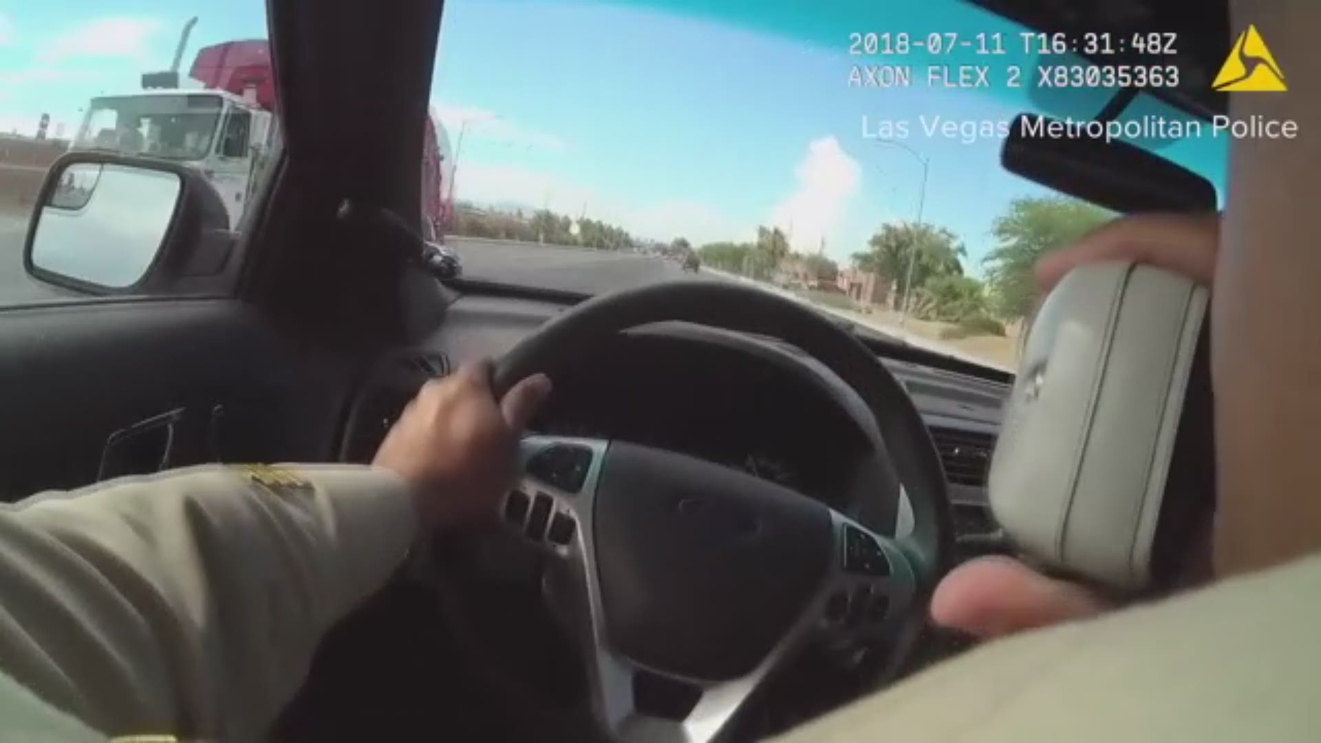 An officer involved in the chase activated his body camera and captured the final moments as murder suspects fired shots at officers along busy streets near downtown Las Vegas.