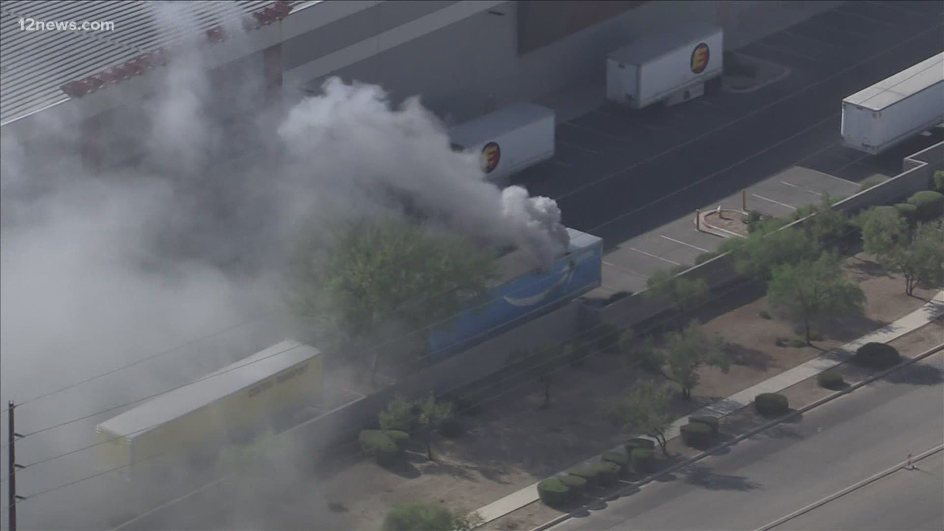An Amazon fulfillment center in Phoenix is currently under a hazardous material incident situation as smoke billows from a semi-truck trailer. Jen Wahl has more.