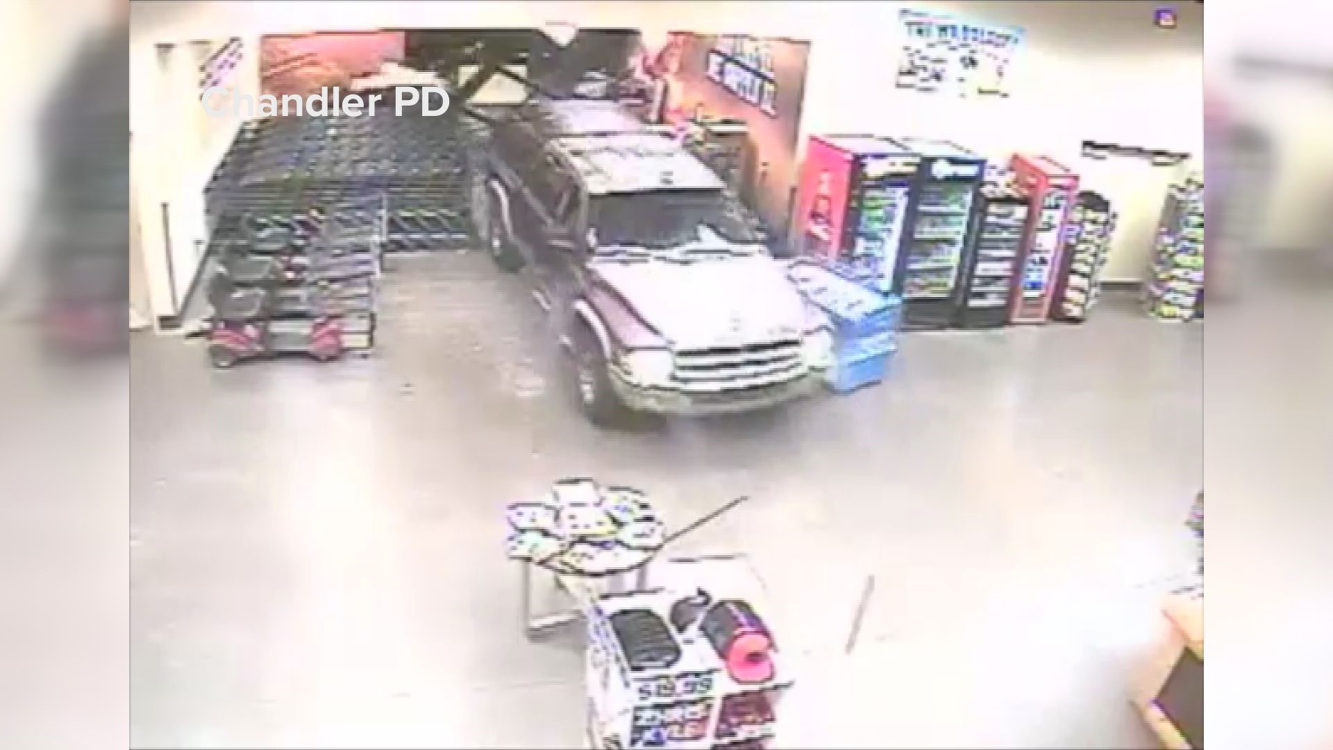 New video shows two alleged burglars driving a stolen pickup truck through the front doors of a Chandler supply store before stealing 21 guns. Police say both suspects were high on meth at the time. All the stolen guns have been recovered.