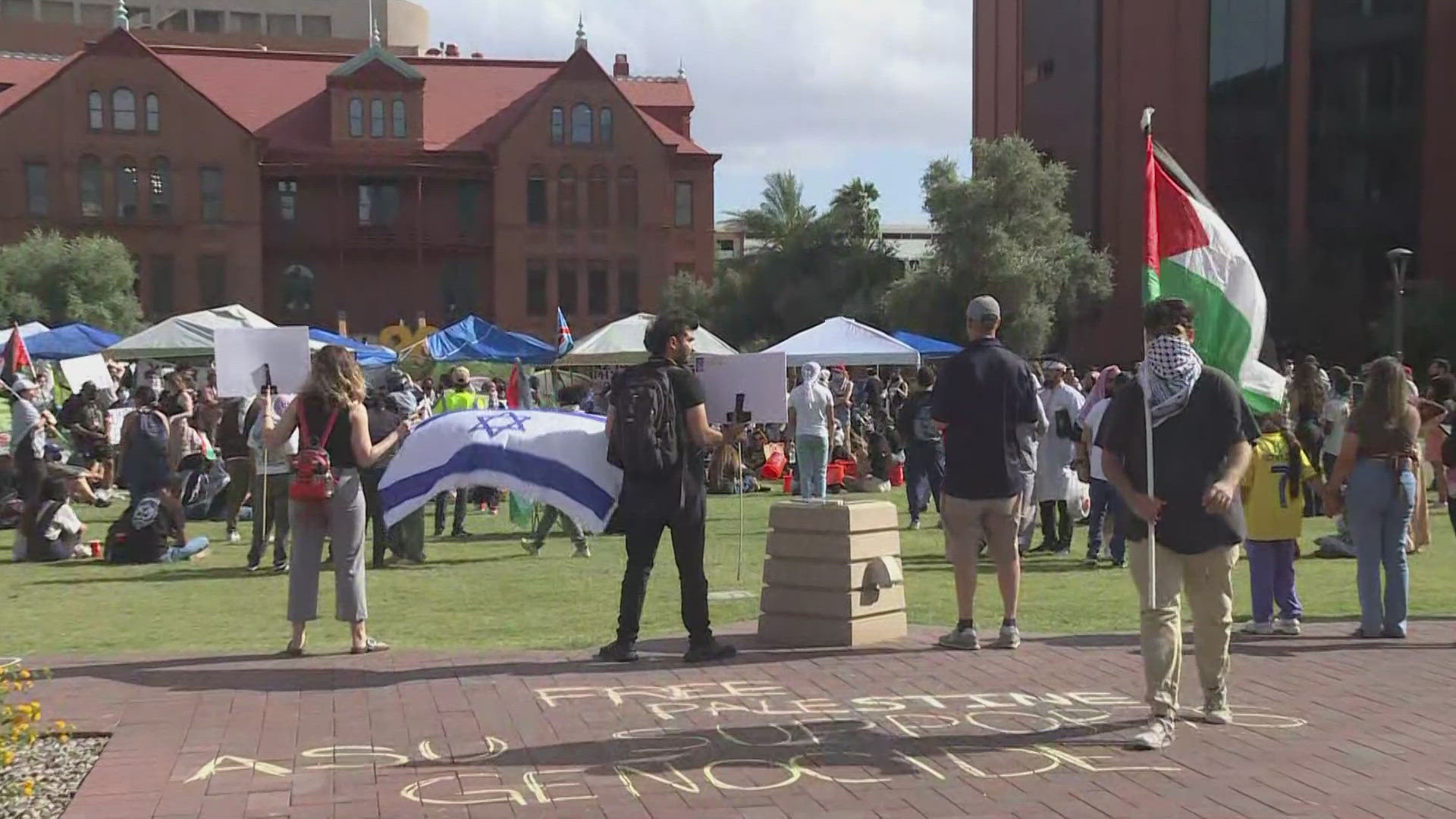 Pro-Palestine protesters gathered near the lawn in front of the Old Main building on Arizona State University's Tempe campus. Three people were arrested.