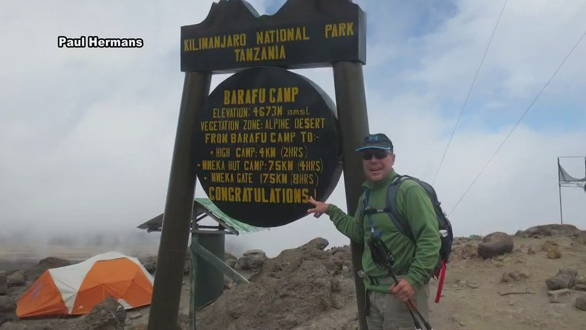 Paul Hermans climbed Africa's tallest mountain, Mt. Kilimanjaro to pay tribute to fallen police officers.