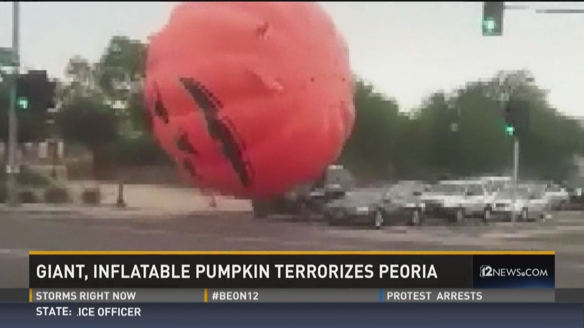 Storm gusts blow giant, inflatable pumpkin through Peoria.