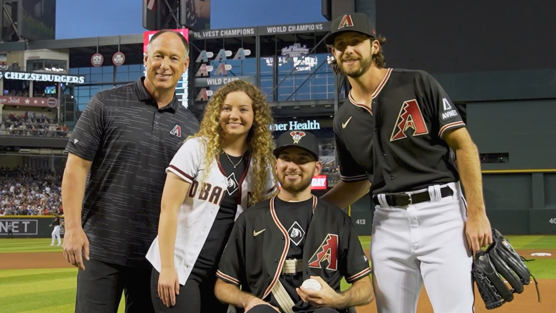 Phoenix officer Tyler Moldovan, who survived getting shot eight times in 2021, threw the first pitch at D-backs game Thursday. Courtesy: Kelsey Grant