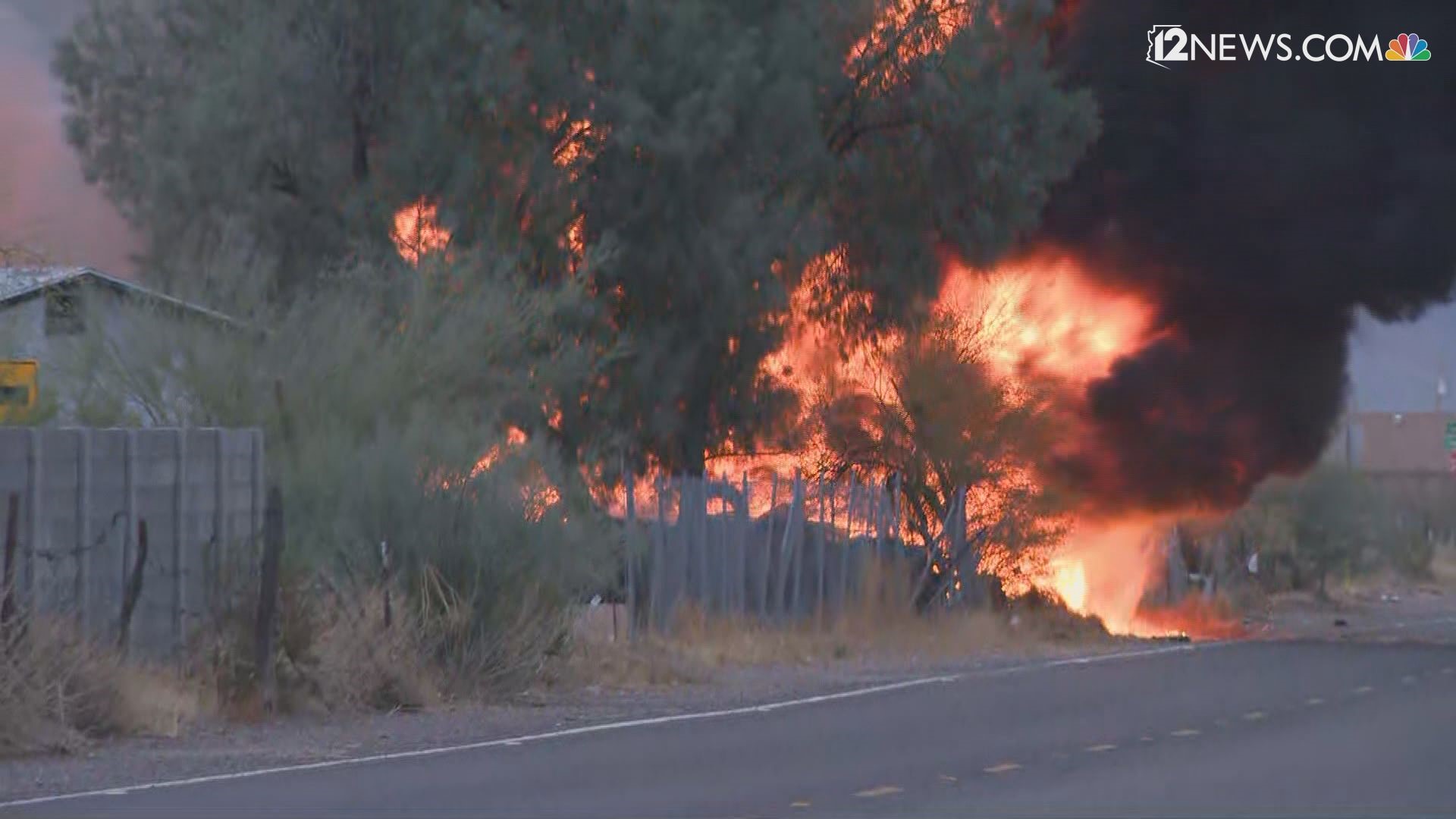 Flames erupt from a tire trailer in Wittmann, Arizona on Dec. 19, 2023.