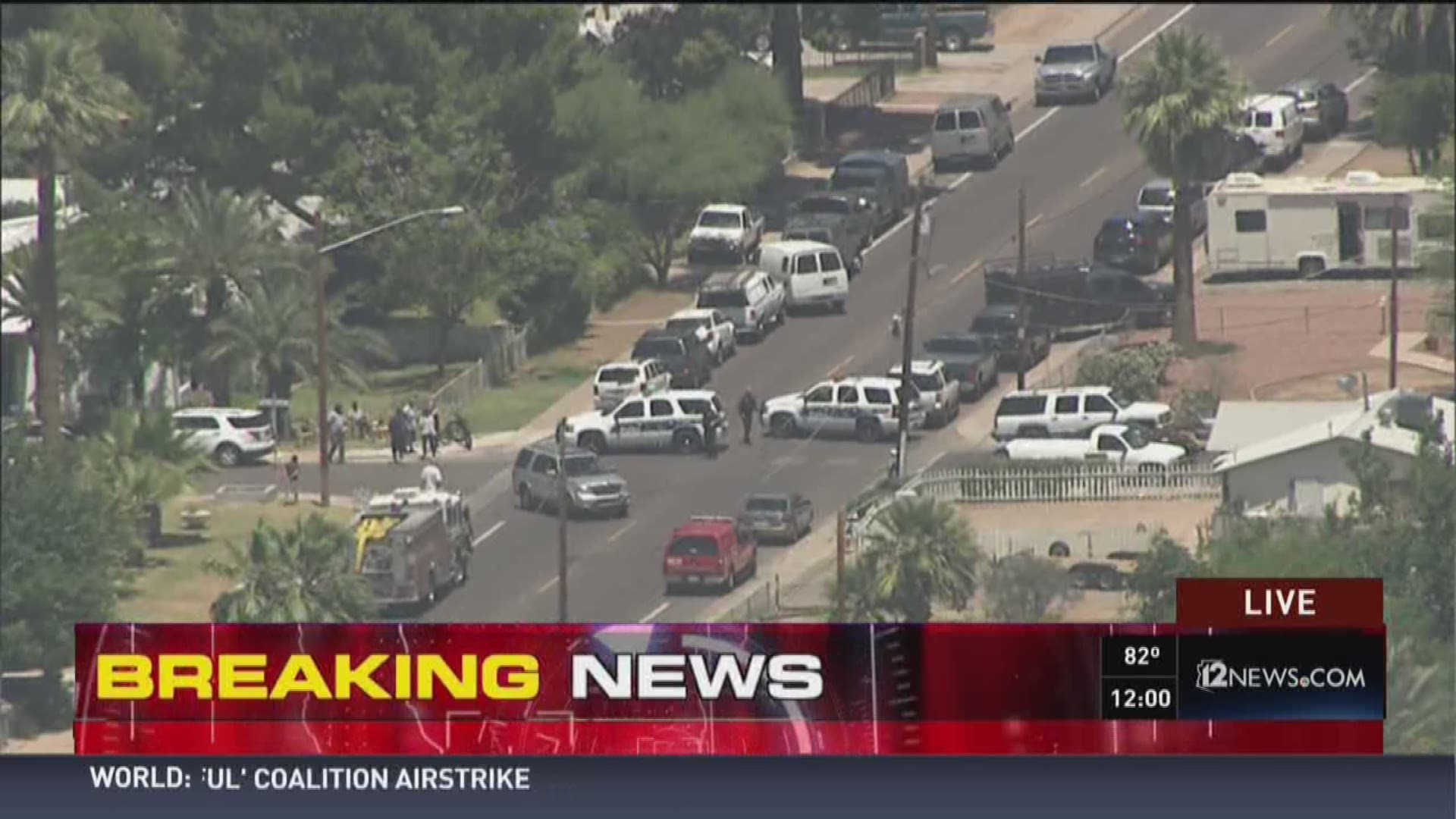 Phoenix police at a barricade situation on 21st Street and Indian School Road.