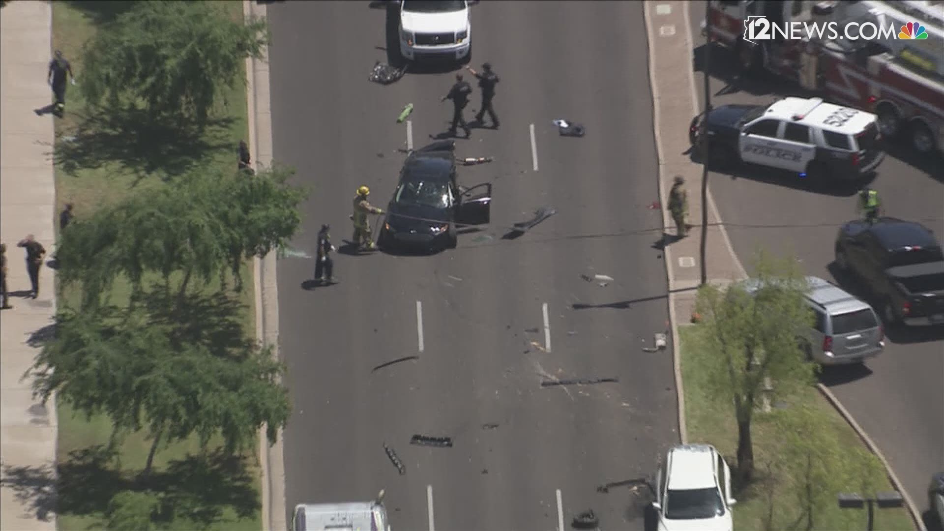 At least one person is in custody after a carjacking in Tempe led to a police pursuit.