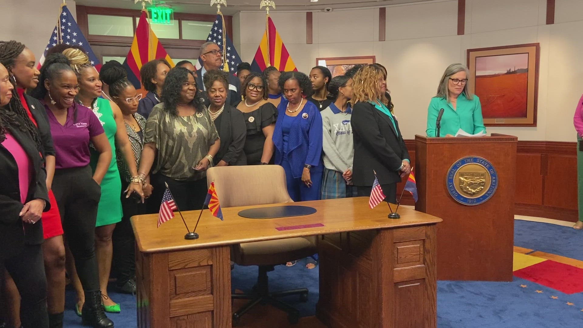 Katie Hobbs said the order will mean state employees and contractors won't have to worry about losing work for simply wearing their natural hair.