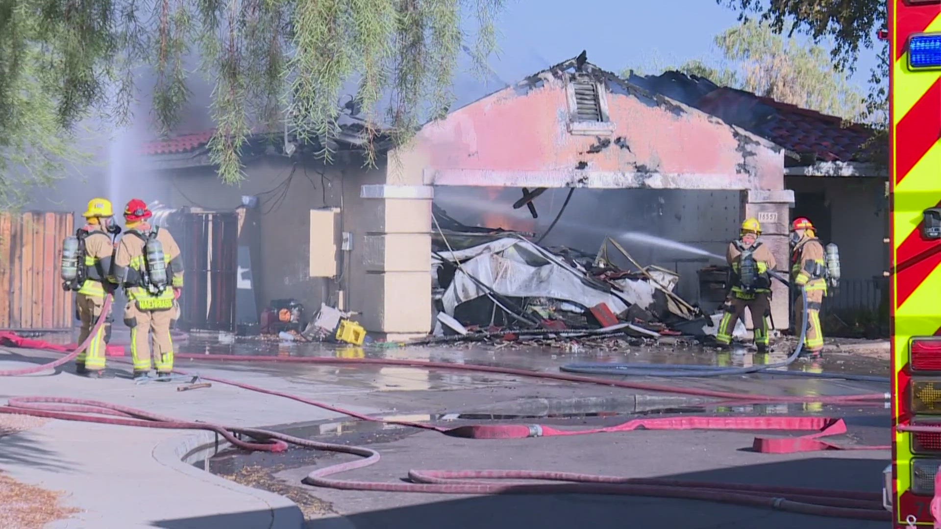 Surprise firefighters jumped into action, saving a dog that had run back into a home that was on fire