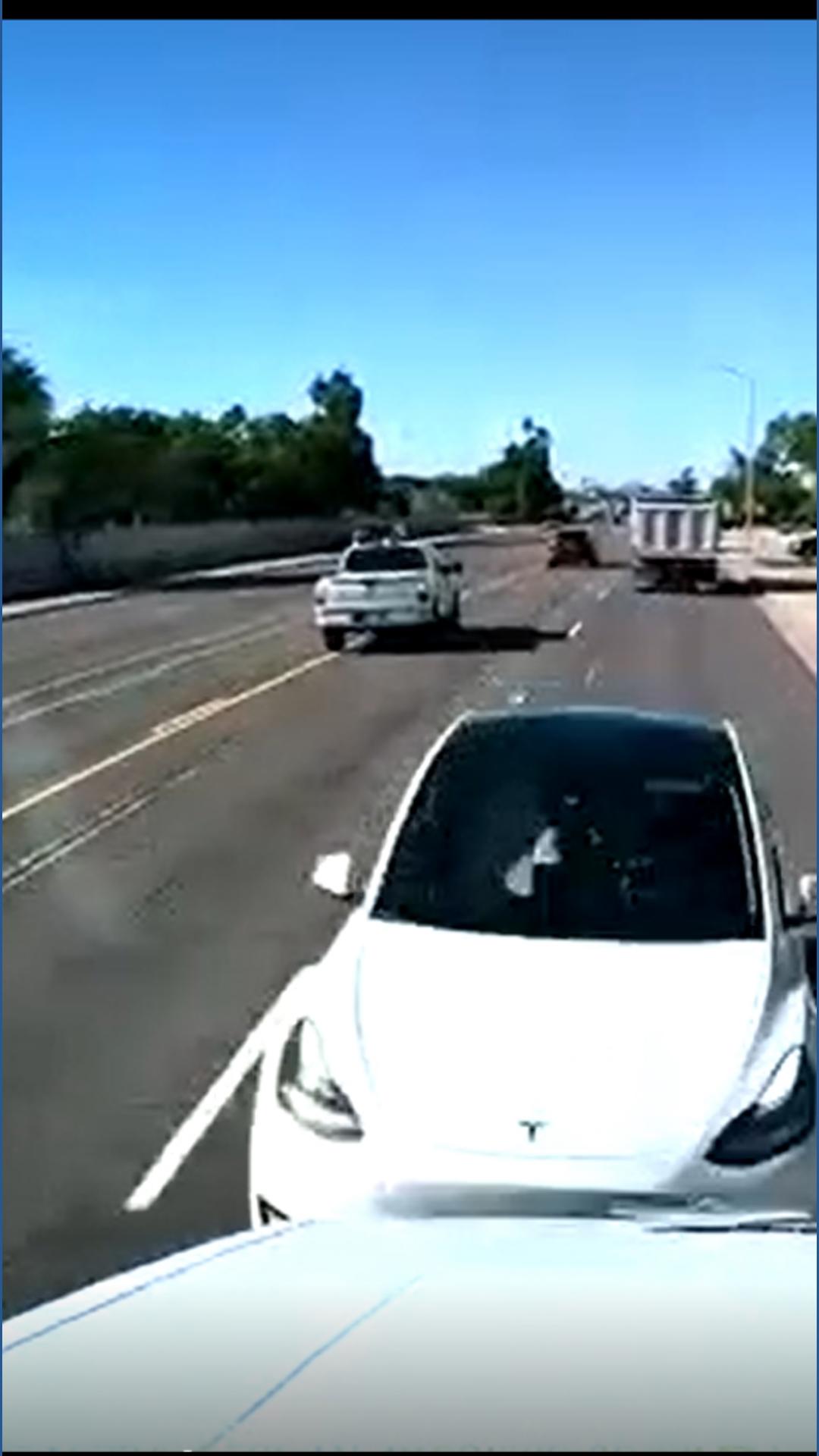 Video shows Tesla crashing into dump truck in Scottsdale | 12news.com