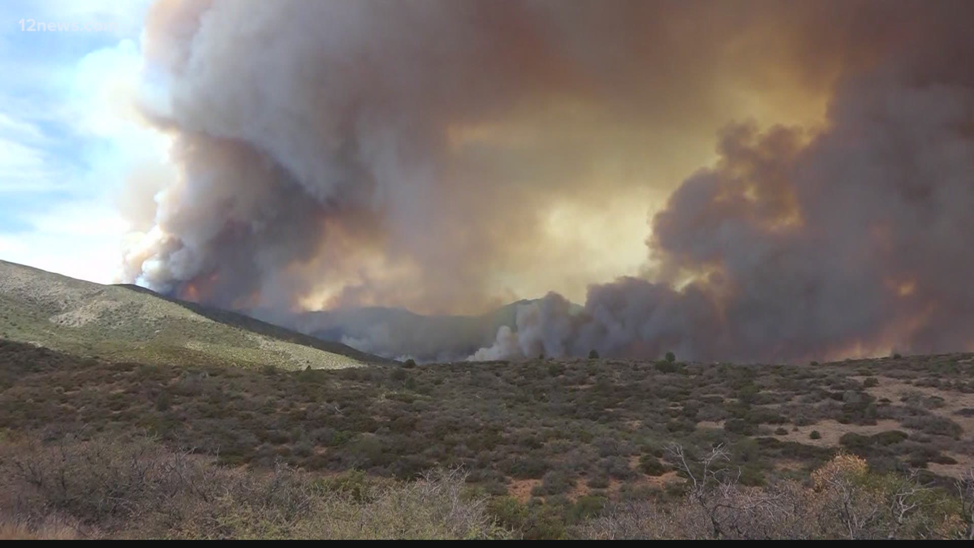 It's a delicate dance in the sky and on the ground as crews scramble to contain multiple wildfires in Arizona.