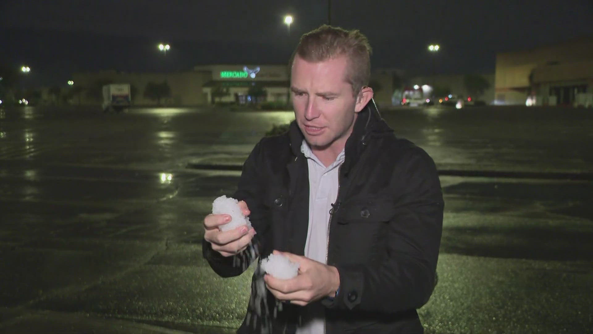 12News Meteorologist Ginger Jeffries explains what graupel is to Troy Lynch while he is out on location.