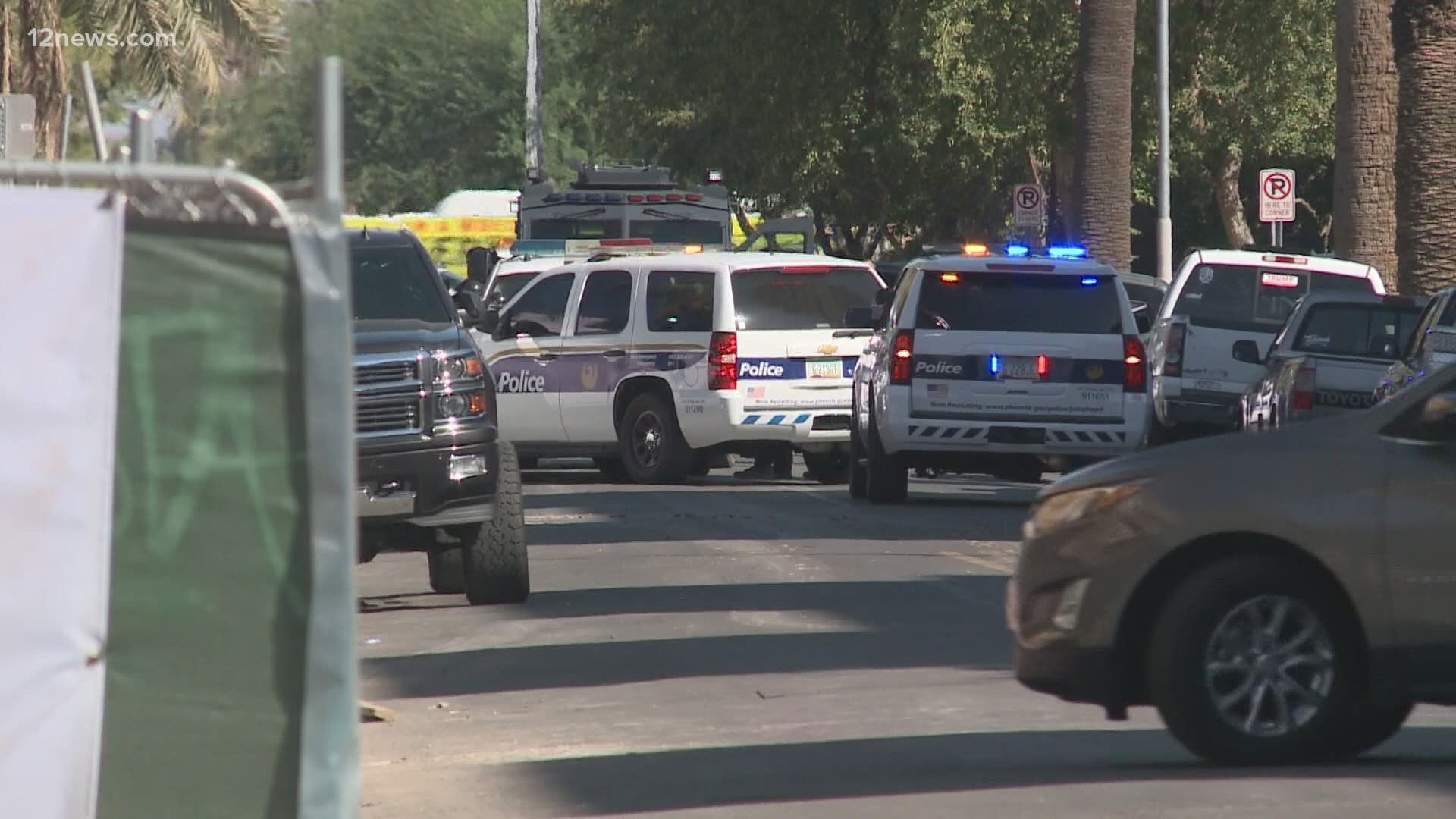 Police say the man and woman were seen fleeing from the scene of the shooting and ran into a downtown Phoenix apartment building.