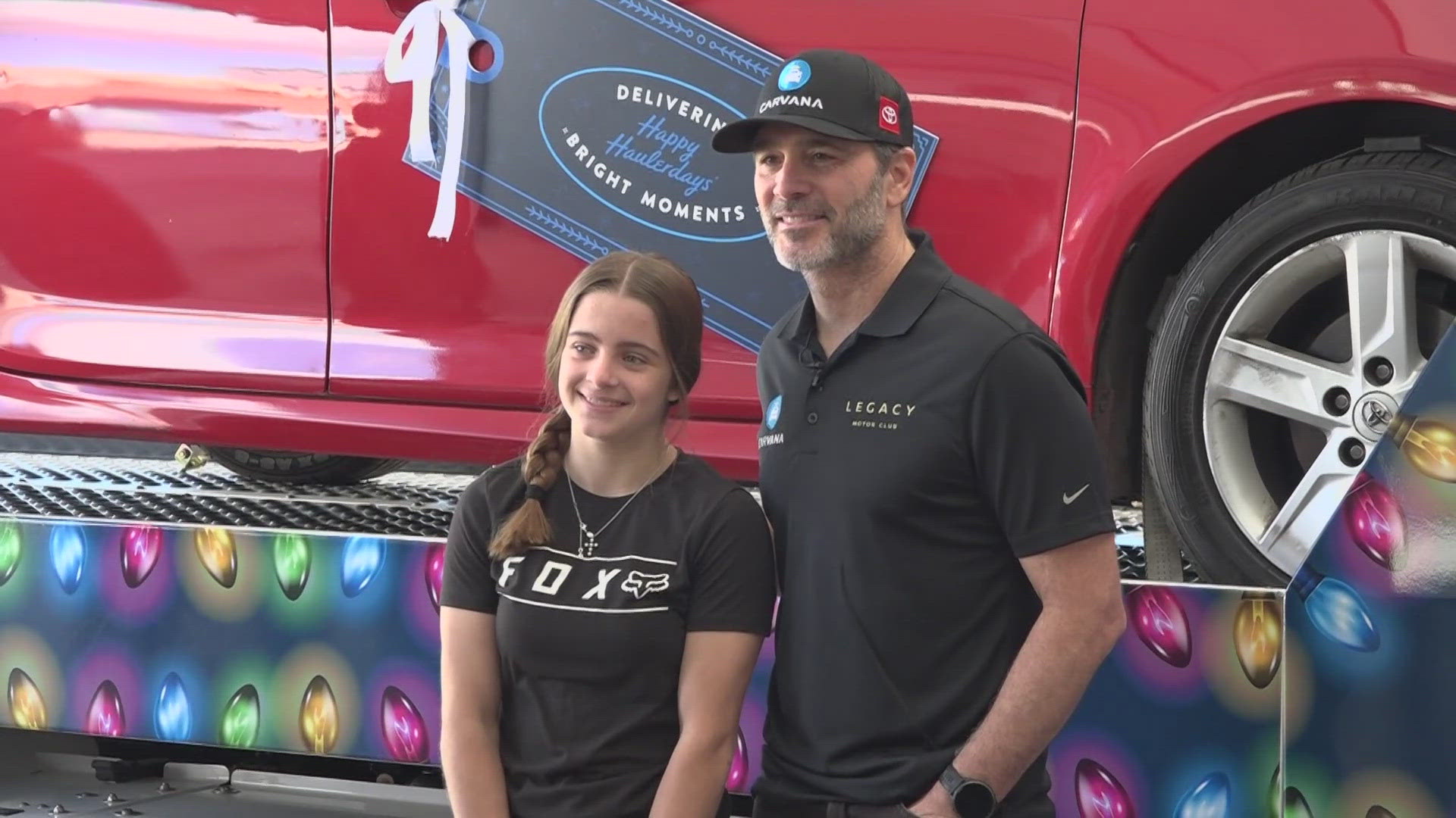 Jimmie Johnson stopped by an auto shop at Paradise Valley High School before his season finale race.