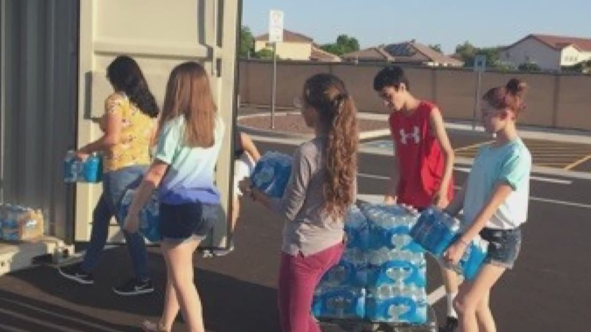 Madison Highland Prep students reach out to the community to collect water for Hurricane Harvey victims in Phoenix.