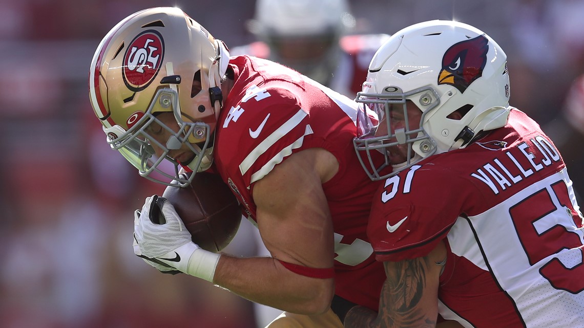 San Francisco 49ers fullback Kyle Juszczyk (44) runs against Arizona  Cardinals linebacker Tanner Vallejo (51) during the first half of an NFL  football game in Santa Clara, Calif., Sunday, Nov. 7, 2021. (