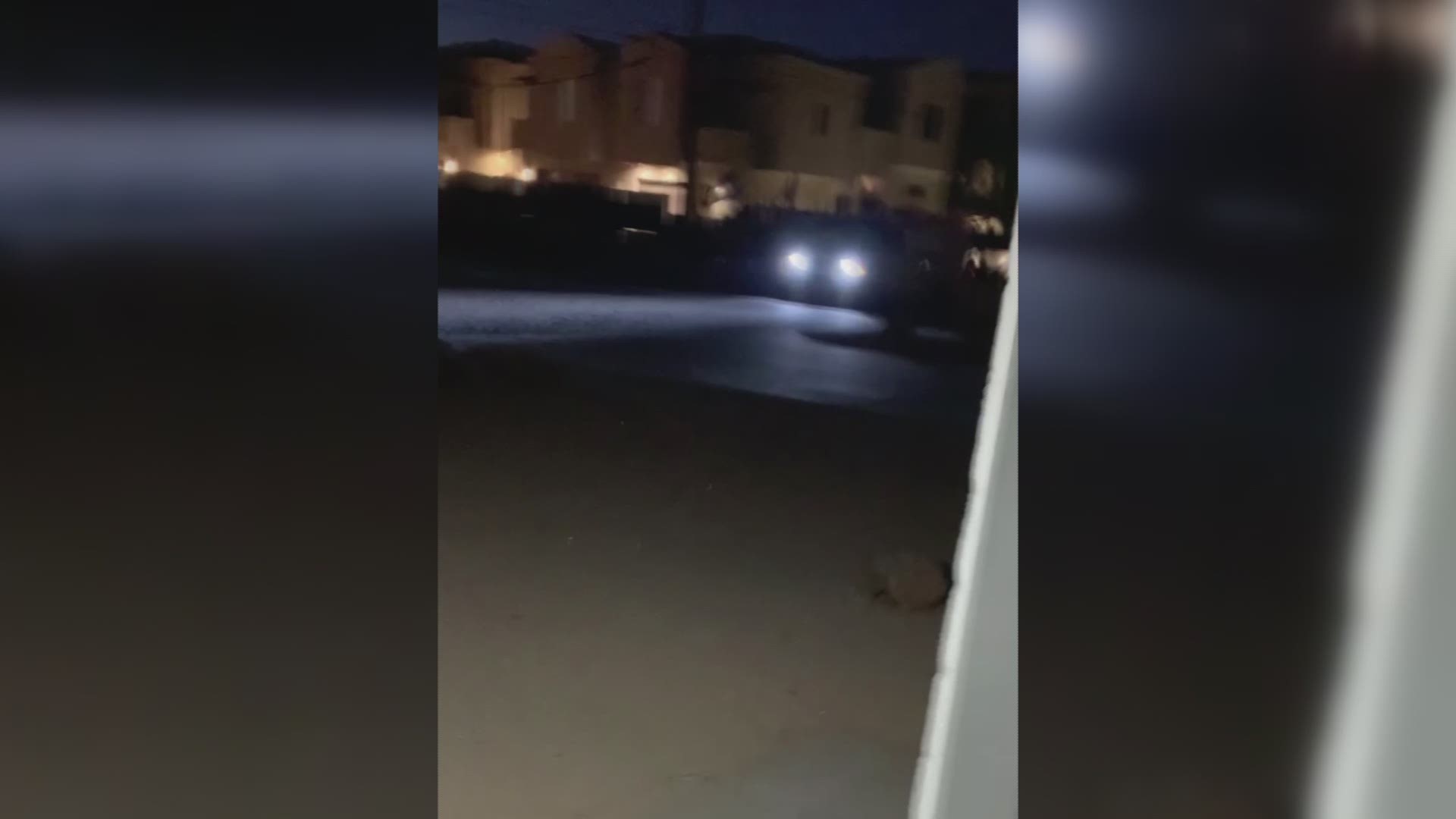Video obtained by 12 News shows a group outside of Arizona Secretary of State Katie Hobbs' home chanting "we are watching you."