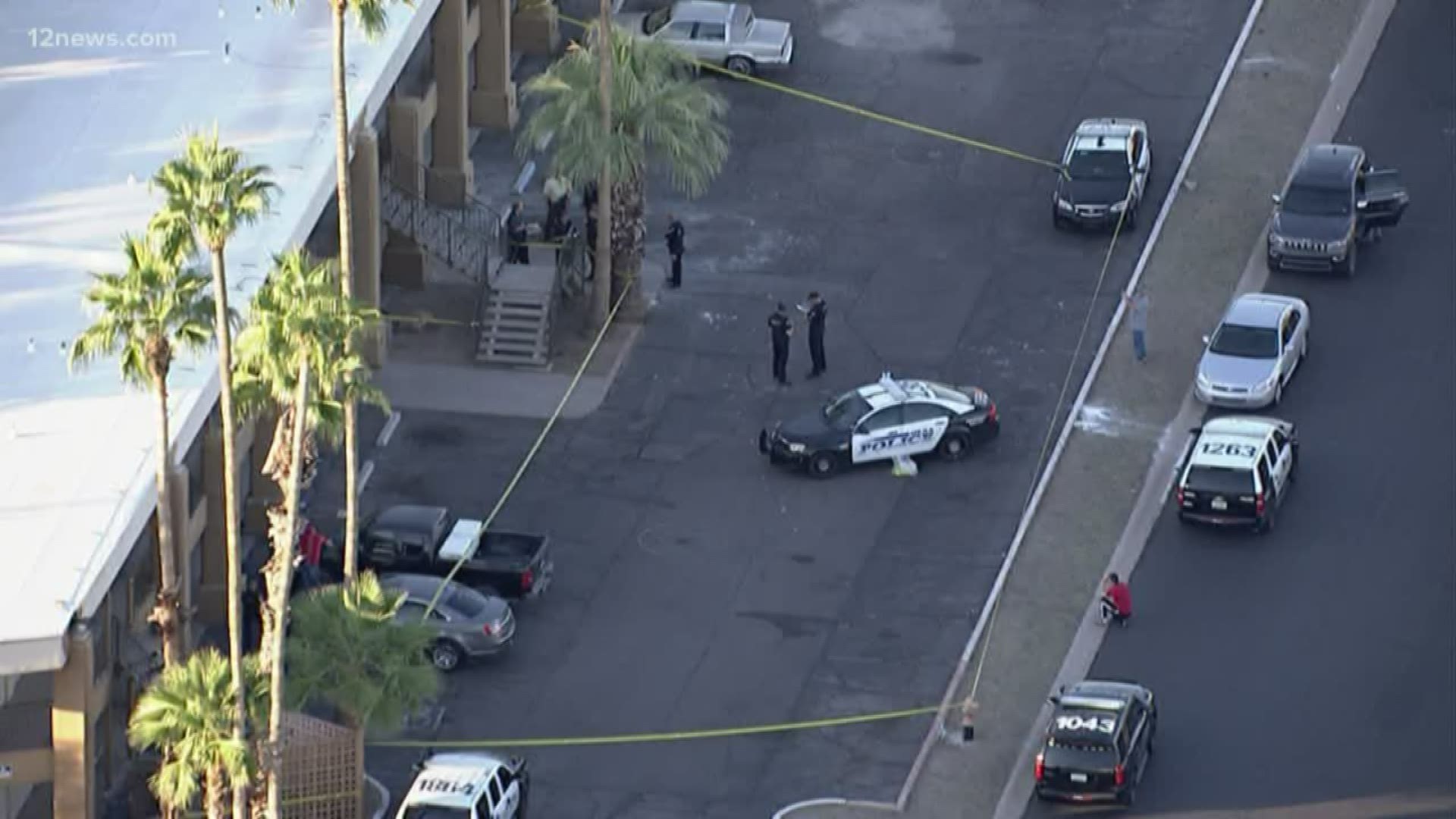 Two people were reportedly shot at a hotel in Mesa near Main Street and Higley.