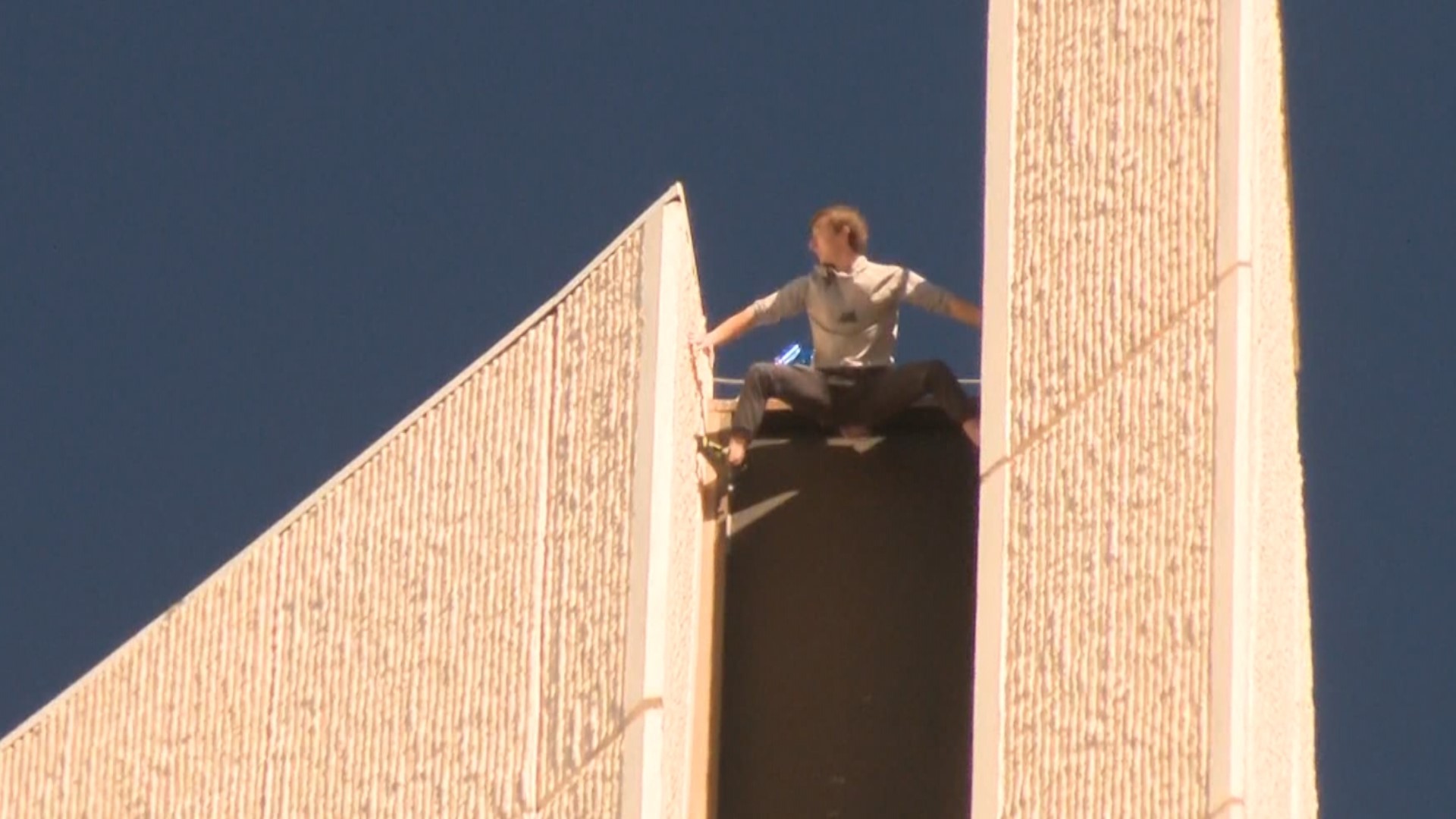 The protestor, known online as Pro-life Spiderman, was seen climbing the building early Tuesday morning.
