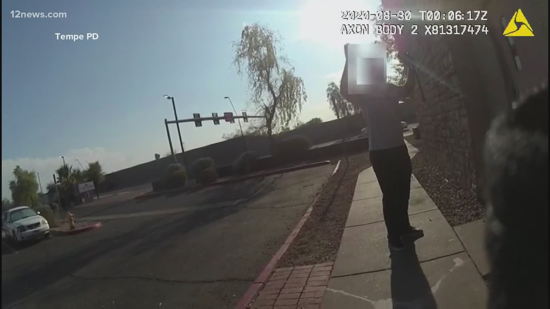 A Tempe police officer is under investigation after he held a Black hotel employee at gunpoint while he was supposed to look for a white suspect.