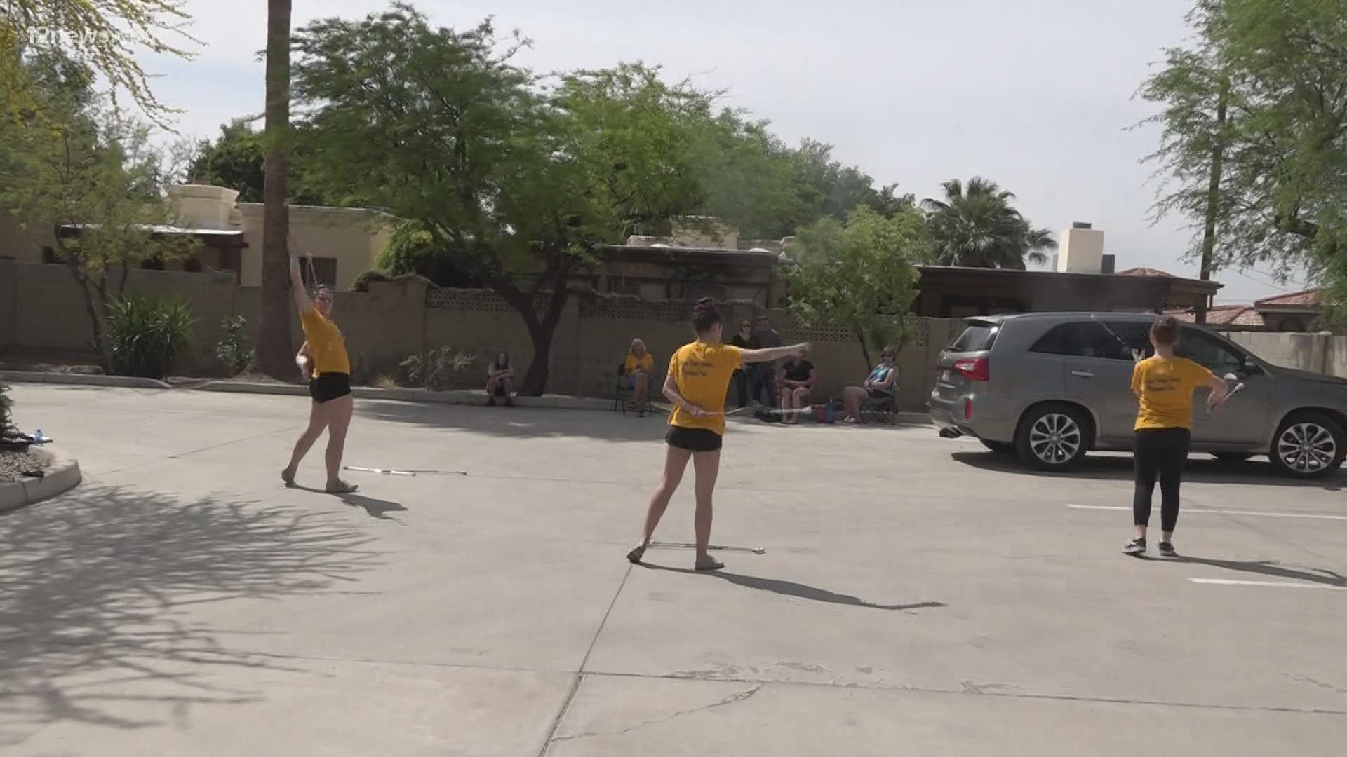Under any condition, twirling practice on the pavement is far from favorable, but with rising temperatures, one team is desperate for an indoor space.