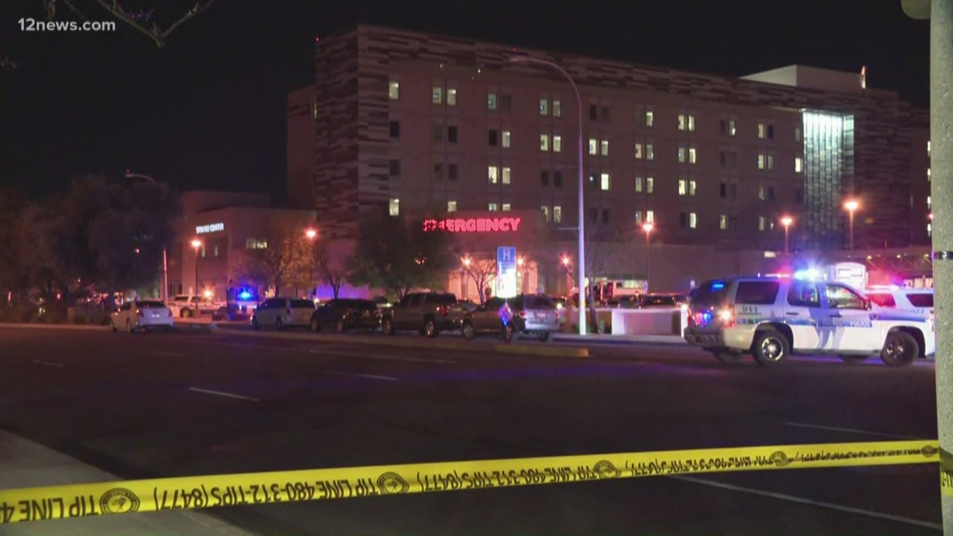 Police said the man was brandishing a rifle and pulled a knife on officers outside the emergency department.