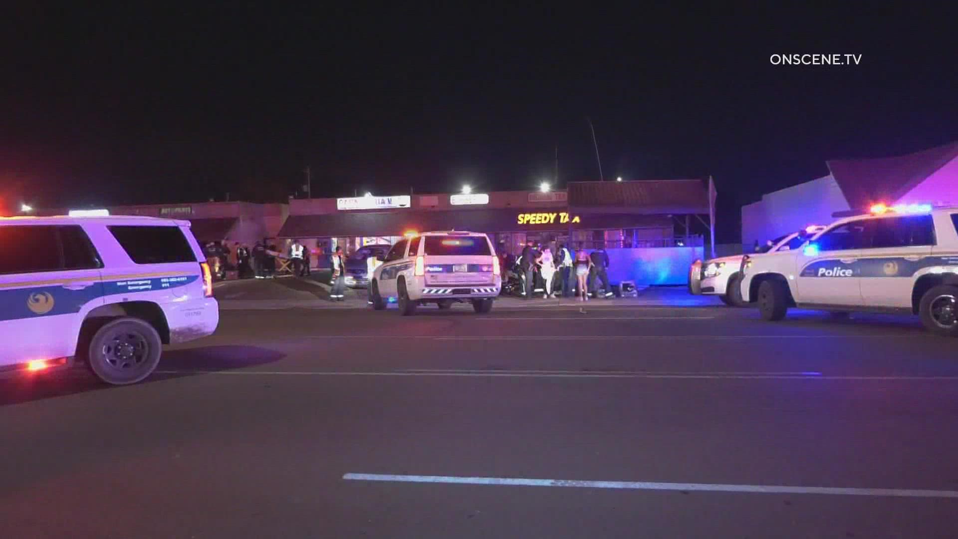 Police are investigating a shooting early Saturday at a business in west Phoenix that injured nine people, including an expecting mother.