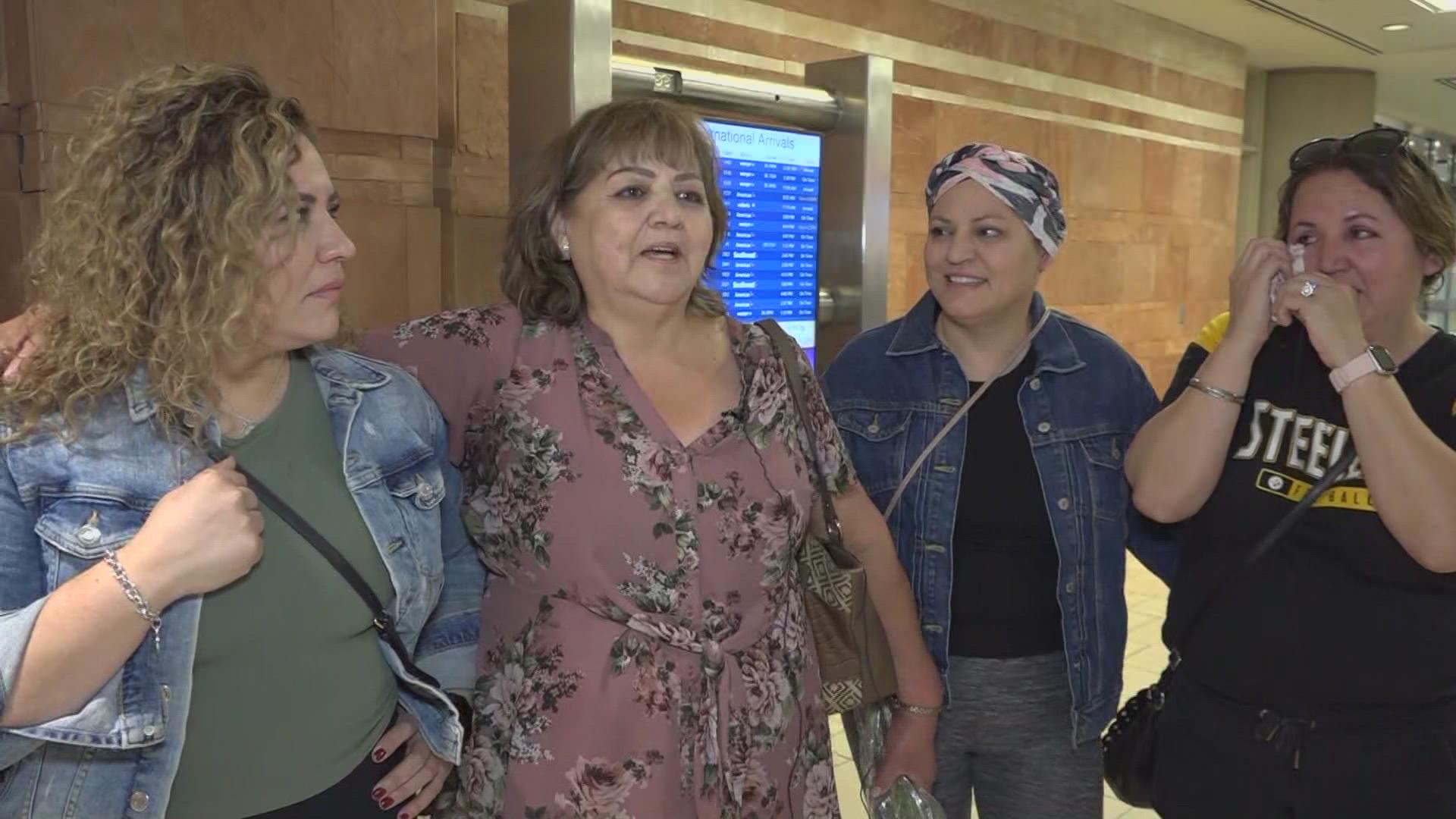The sisters traveled across the country just to greet their mom at Sky Harbor Airport. It was a reunion for the books.