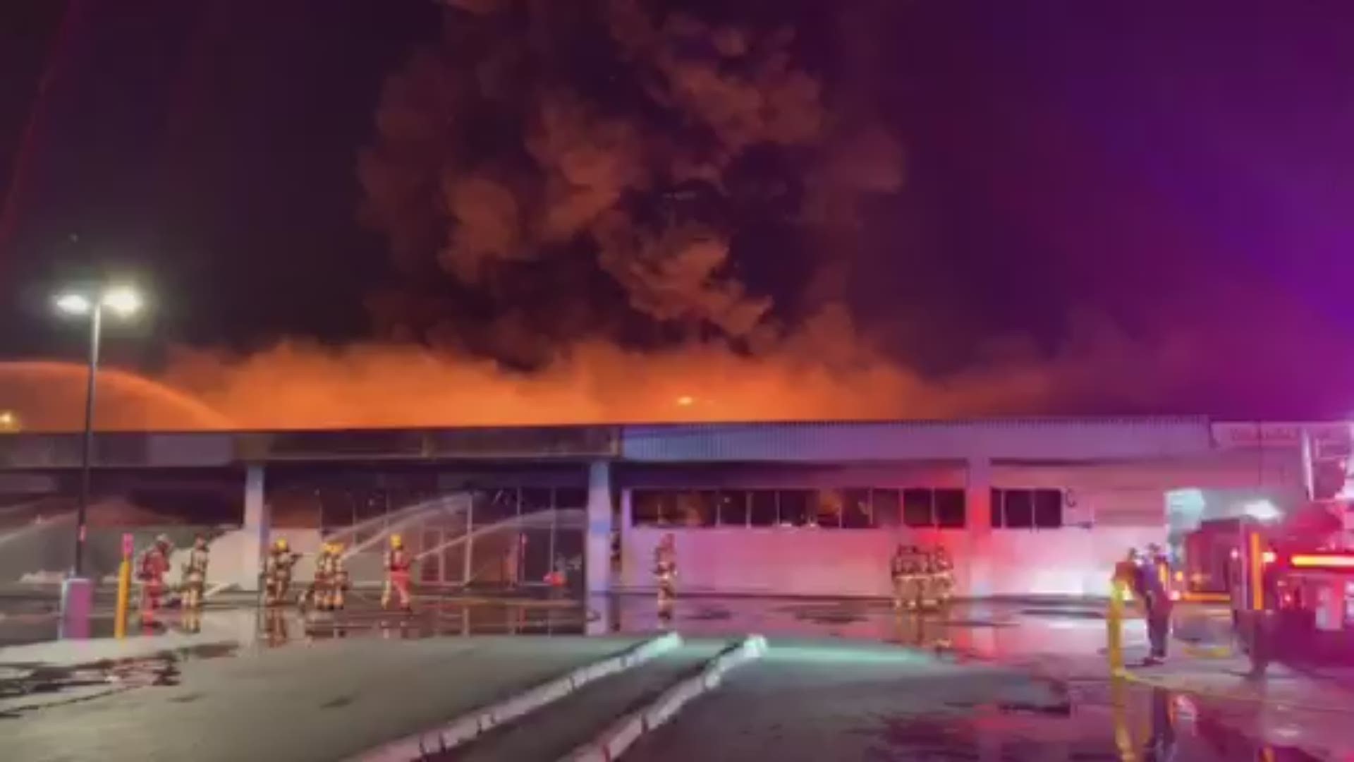 Firefighters battled an overnight fire at a strip mall in Phoenix. Video: Phoenix Fire Department.