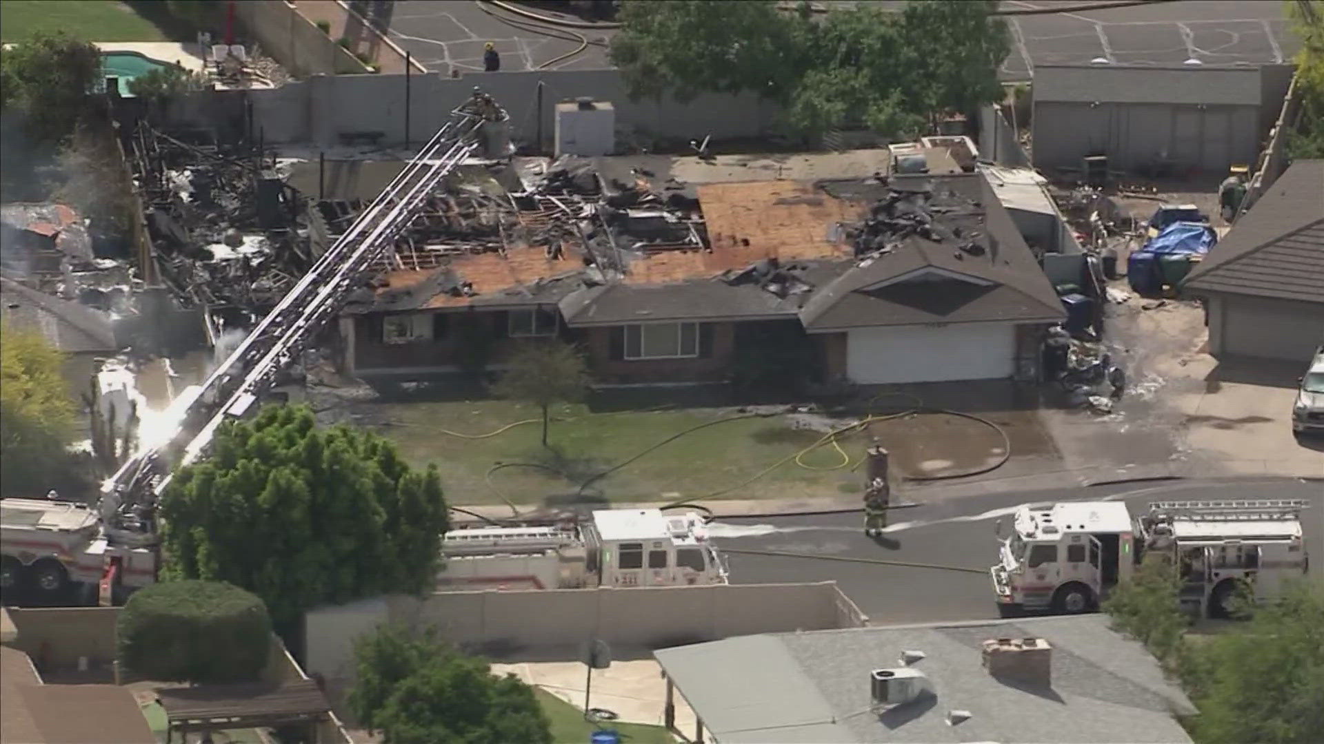 Footage from Sky12 shows multiple houses with extensive damage.