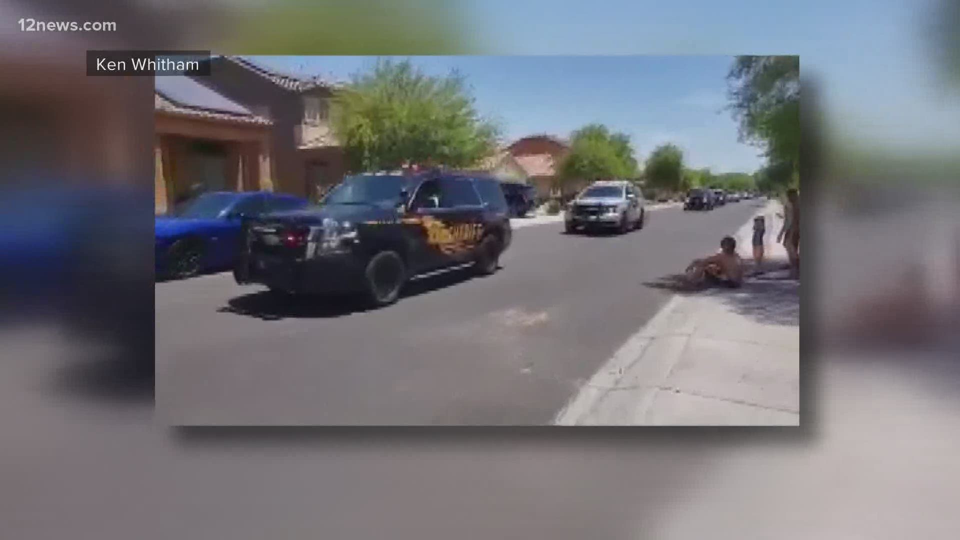 Deputies with the Maricopa County Sheriff’s Office, troopers from Arizona Department of Public Safety and Arizona Rangers paraded down the boy’s street.