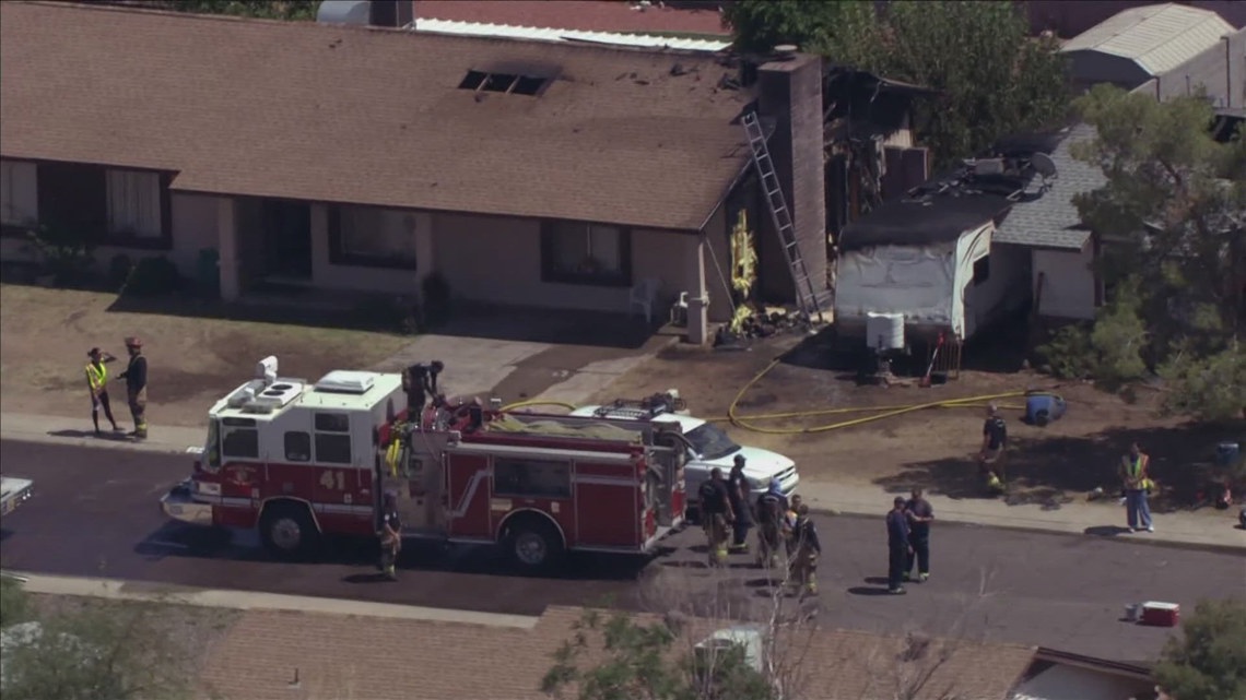 1 injured, 8 displaced in double house fire | 12news.com