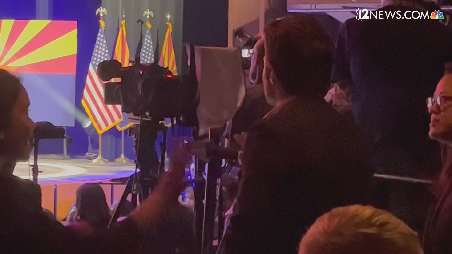 Video shows security escorting a man out of a Tempe event featuring President Joe Biden.