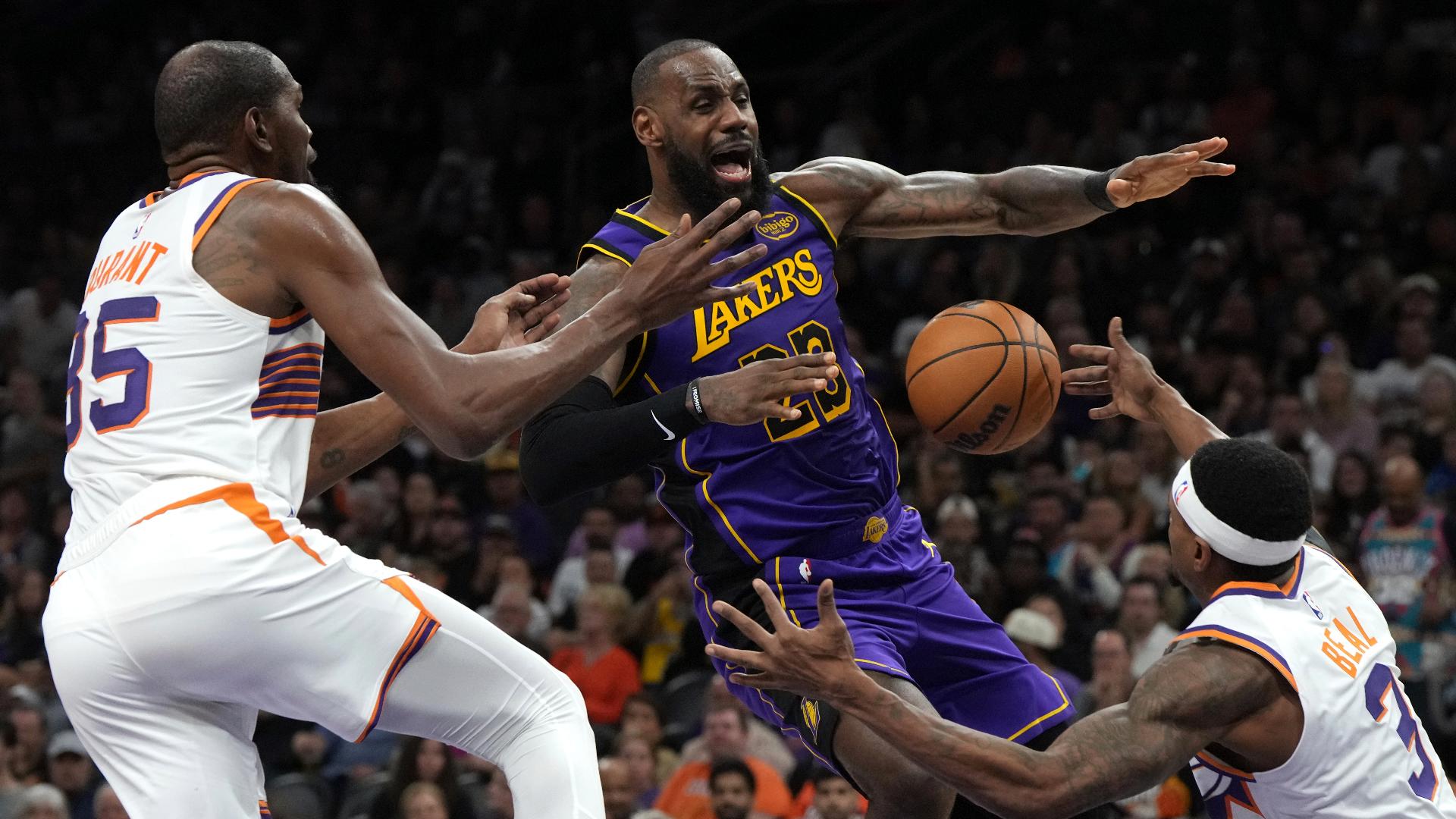 Mike Budenholzer, Devin Booker and Royce O'Neale discuss limiting LeBron James to 11 points in the Suns' 109-105 win over the Lakers Monday night.