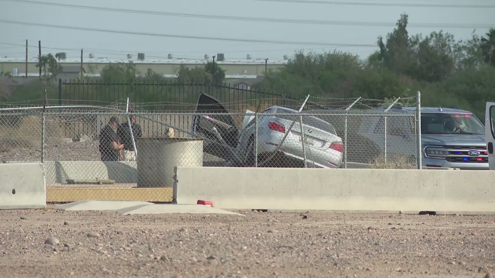 Phoenix police said the driver was killed when their vehicle hit a concrete structure.