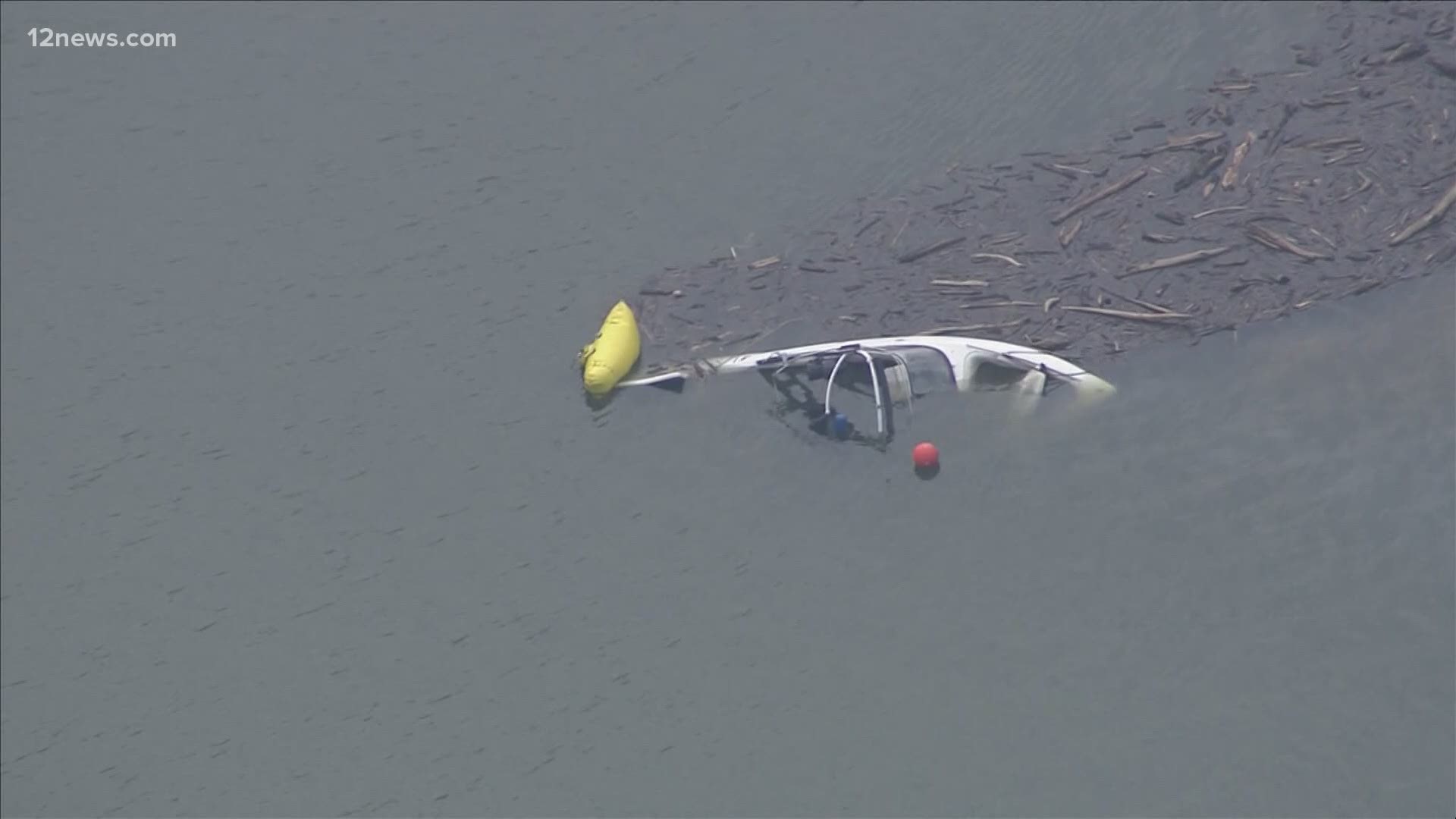 The body of a missing woman has been recovered after she and another passenger were killed Saturday when their boat capsized during flash flooding at the lake.