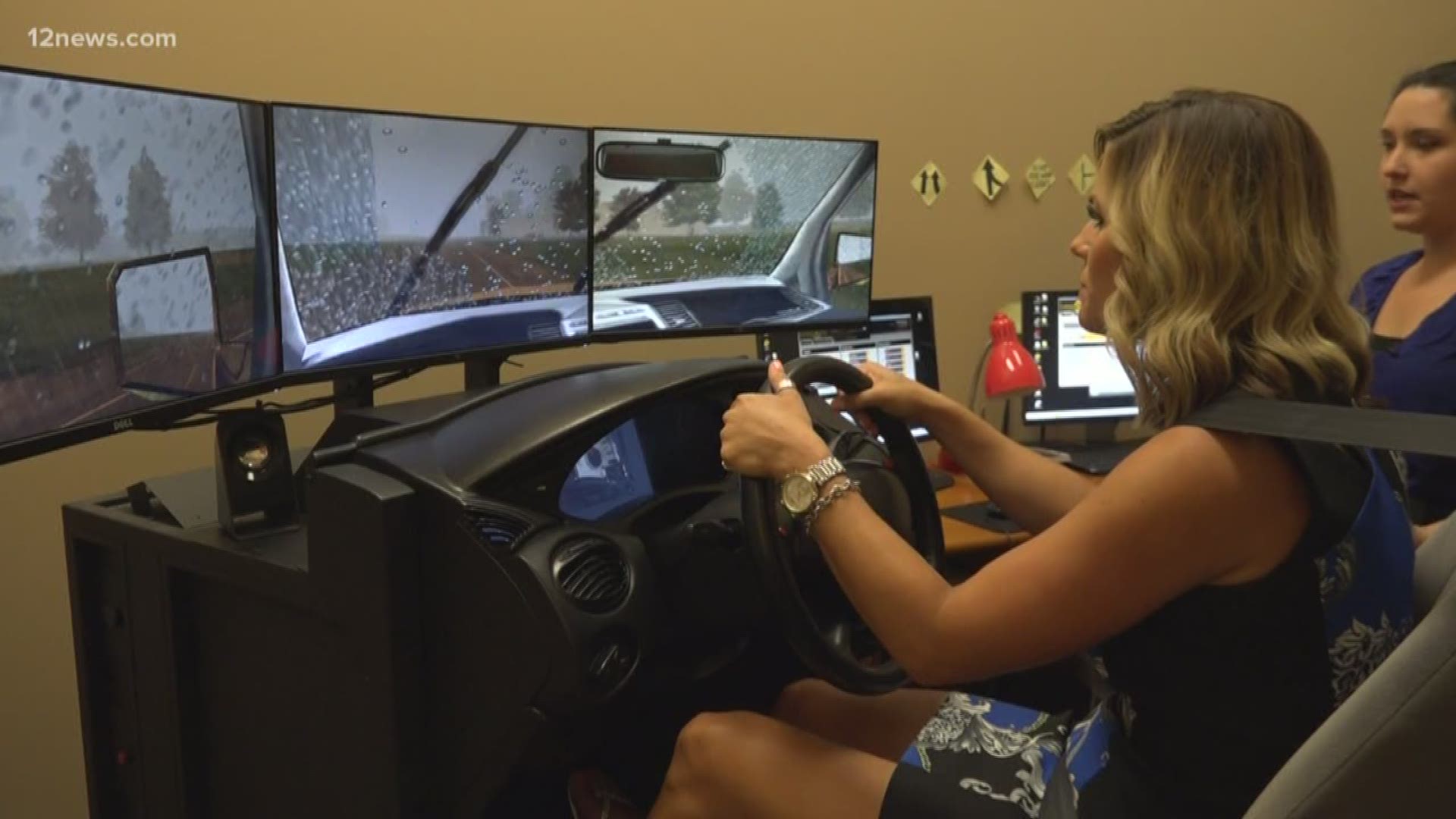 We try a monsoon driving simulator for the best tips on how to drive safely in a monsoon storm.