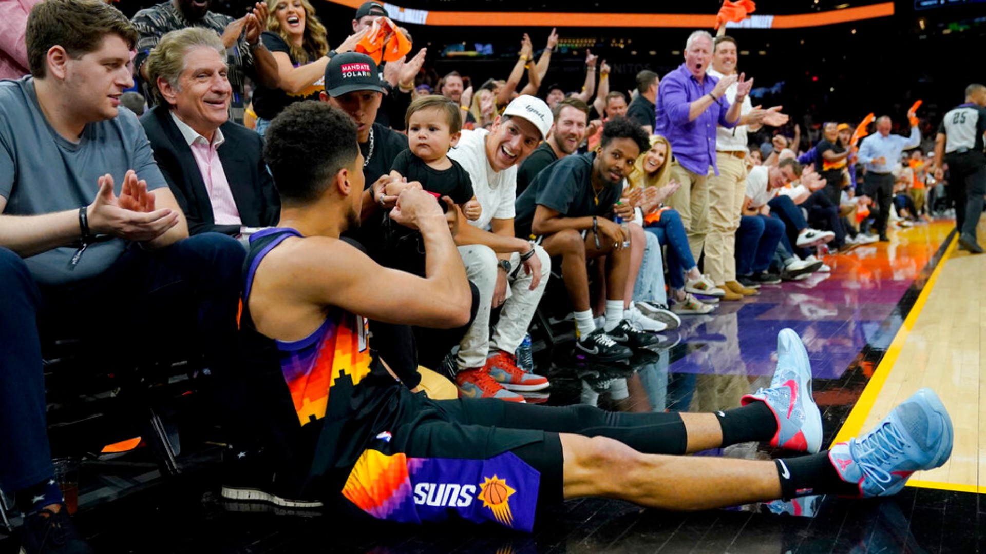 Devin Booker Fist Bumps A Baby During NBA Playoff Game – Hollywood