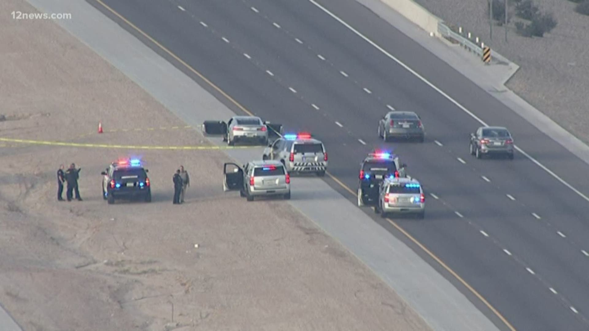 Sky 12 is over a possible shooting on the Loop 303 near Camelback. The Loop 303 northbound in the area of Camelback Road is closed while troopers investigate.