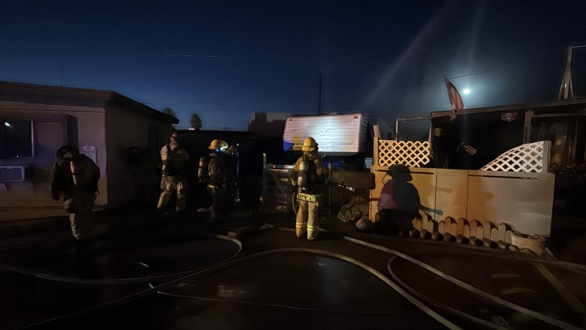 Woman dead, 2 adults treated for smoke inhalation after Phoenix trailer fire