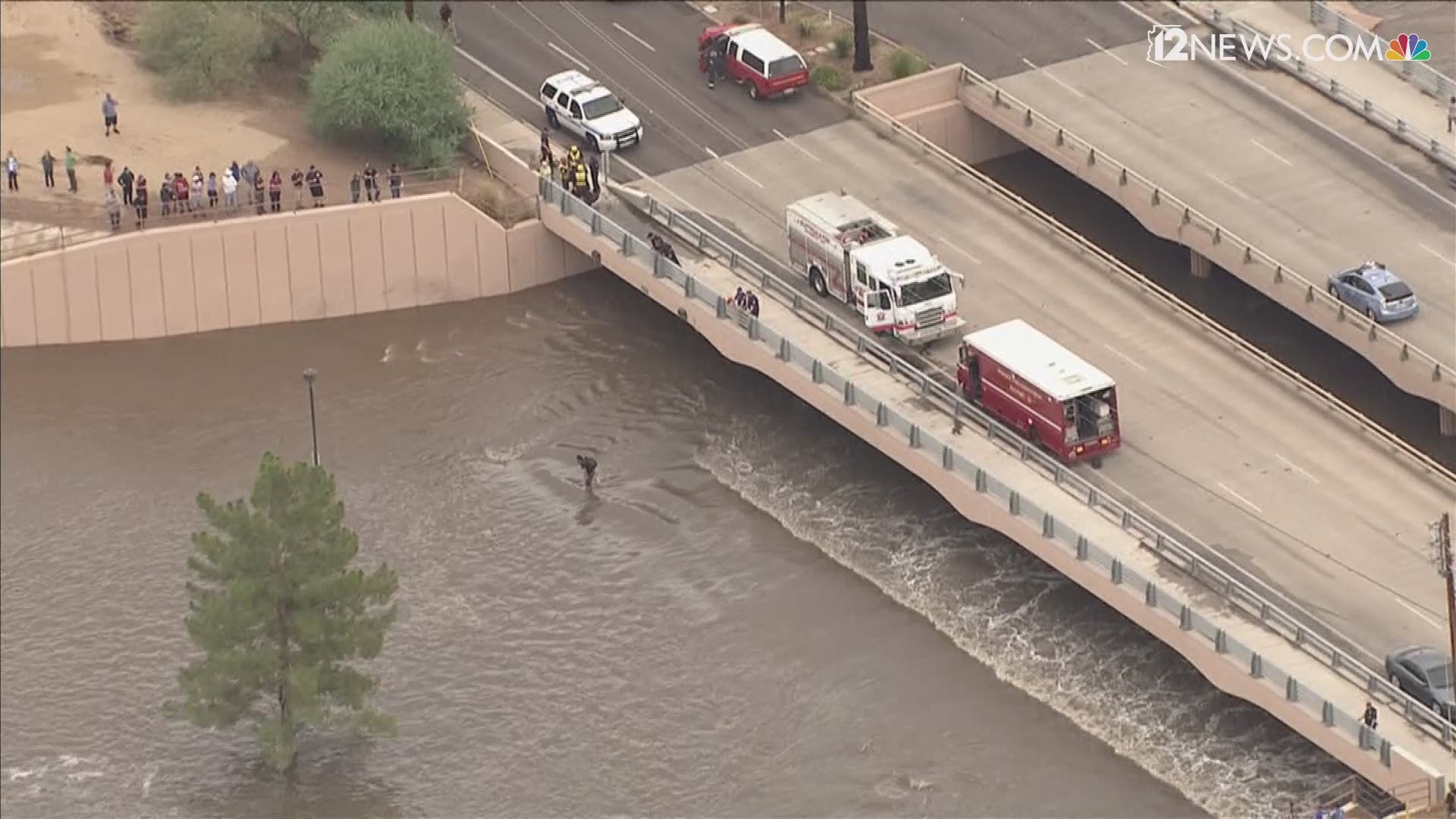 A man got trapped in flood waters near McDowell and Miller roads. Scottsdale fire went into El Dorado wash to rescue him.
