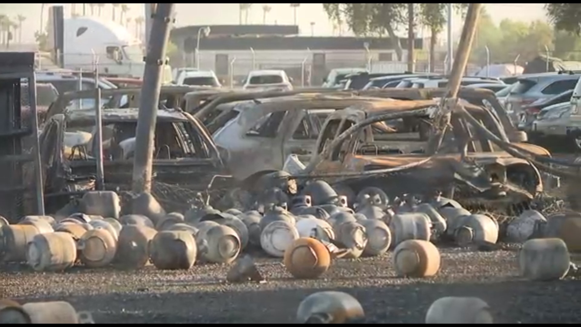 Hundreds of ashed propane tanks now sit at the site of Thursday's fire at a business near 40th and Washington streets.