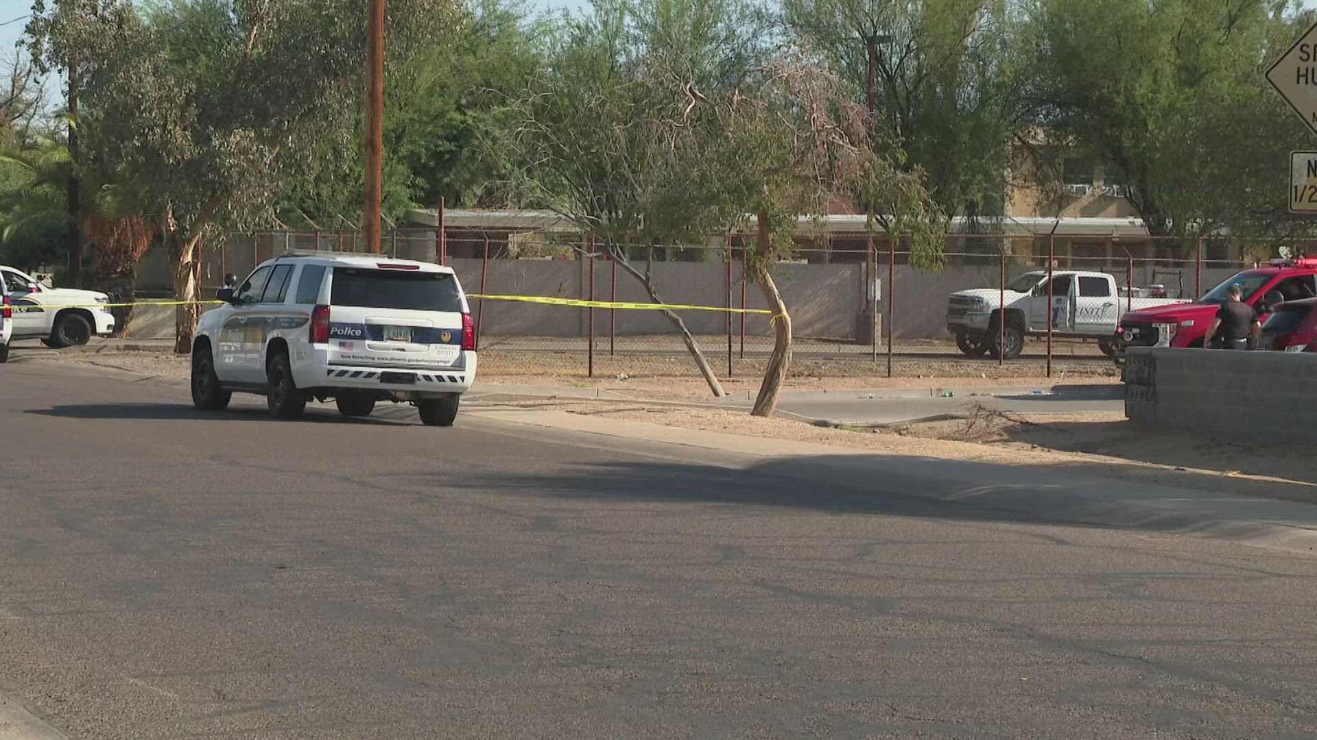 One person is dead and another is fighting for his life following a shooting in central Phoenix, the city's police department said. The suspect is at large.