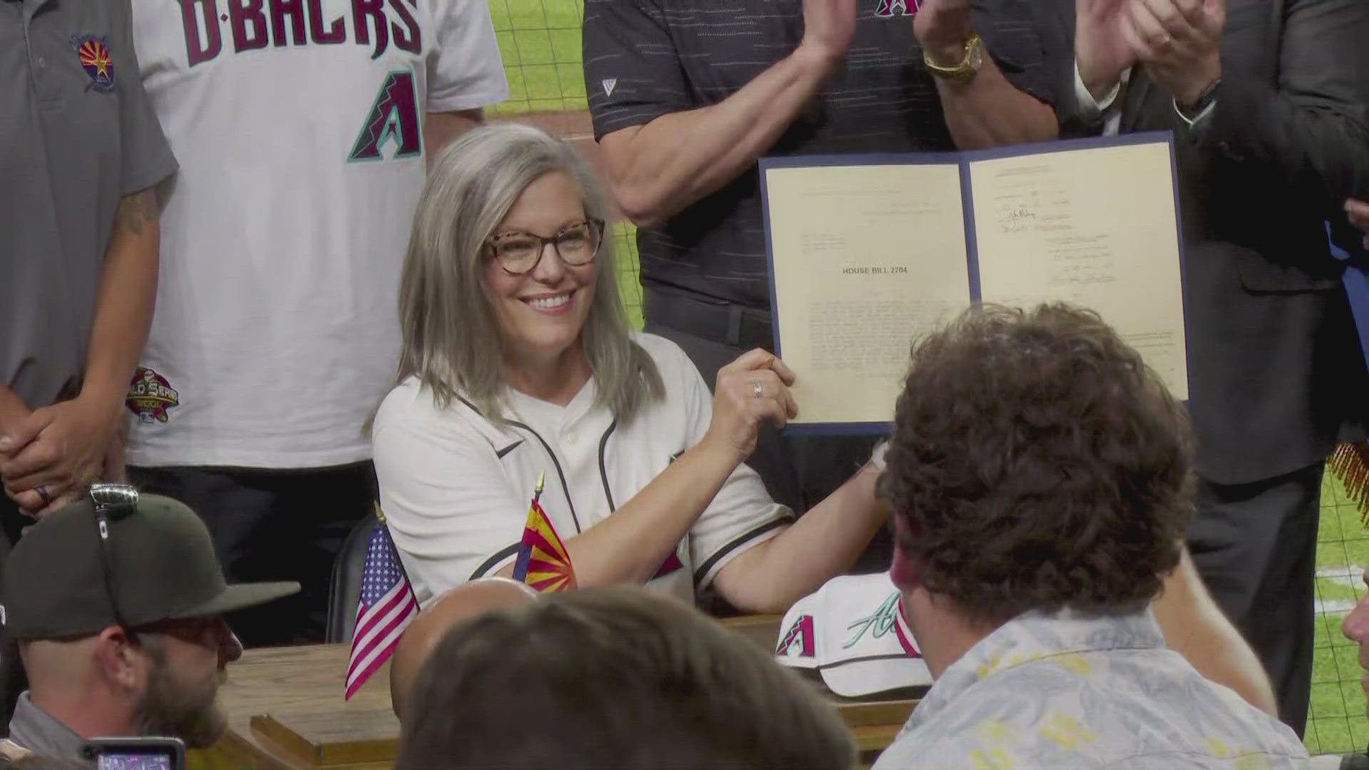 Gov. Hobbs joins the Arizona Diamondbacks to commemorate the signing of HB 2704, a bill that secures the economic and social future of baseball in downtown Phoenix.