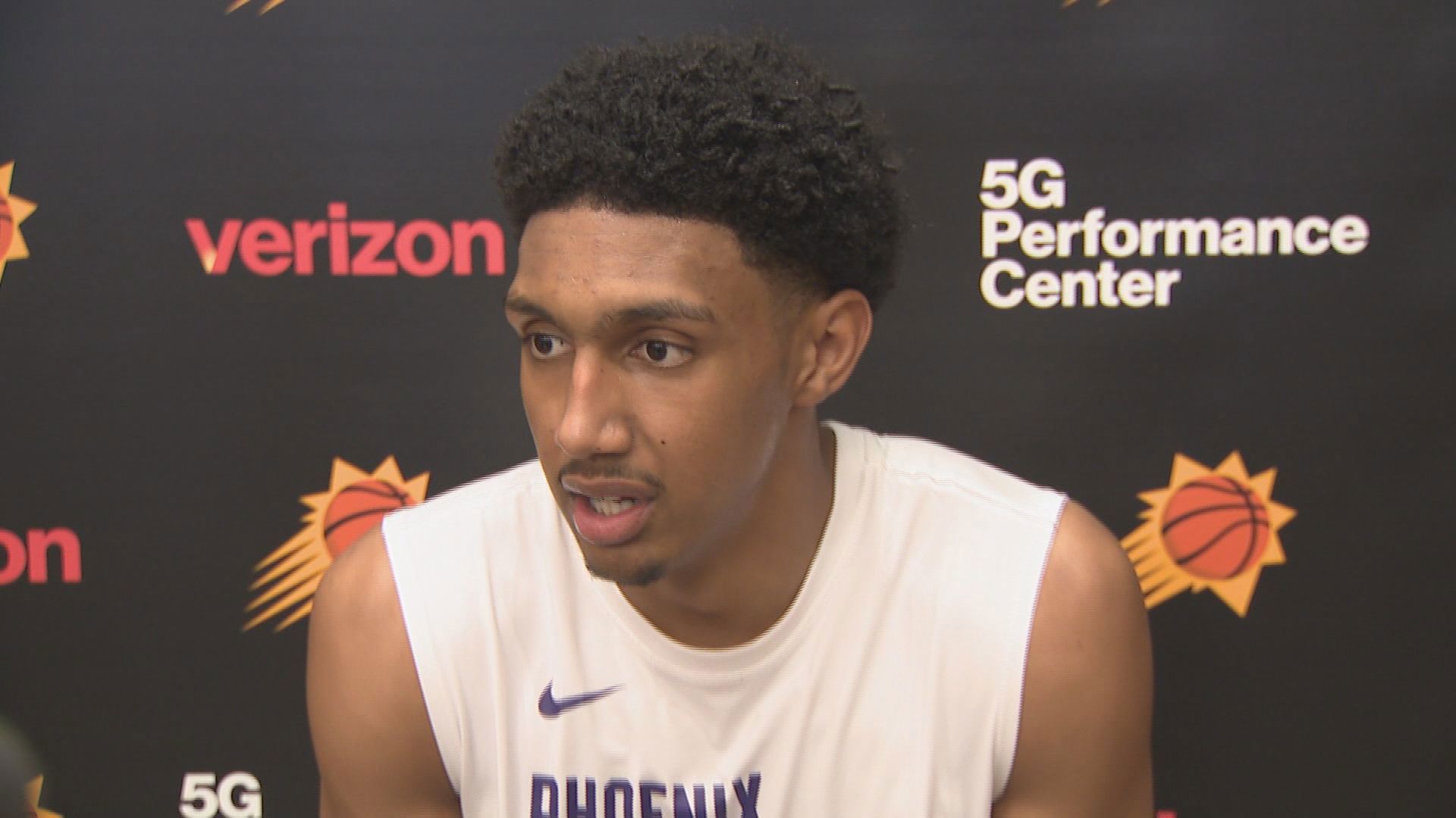 Phoenix Suns rookie first-round pick Ryan Dunn speaks to the media after practice.