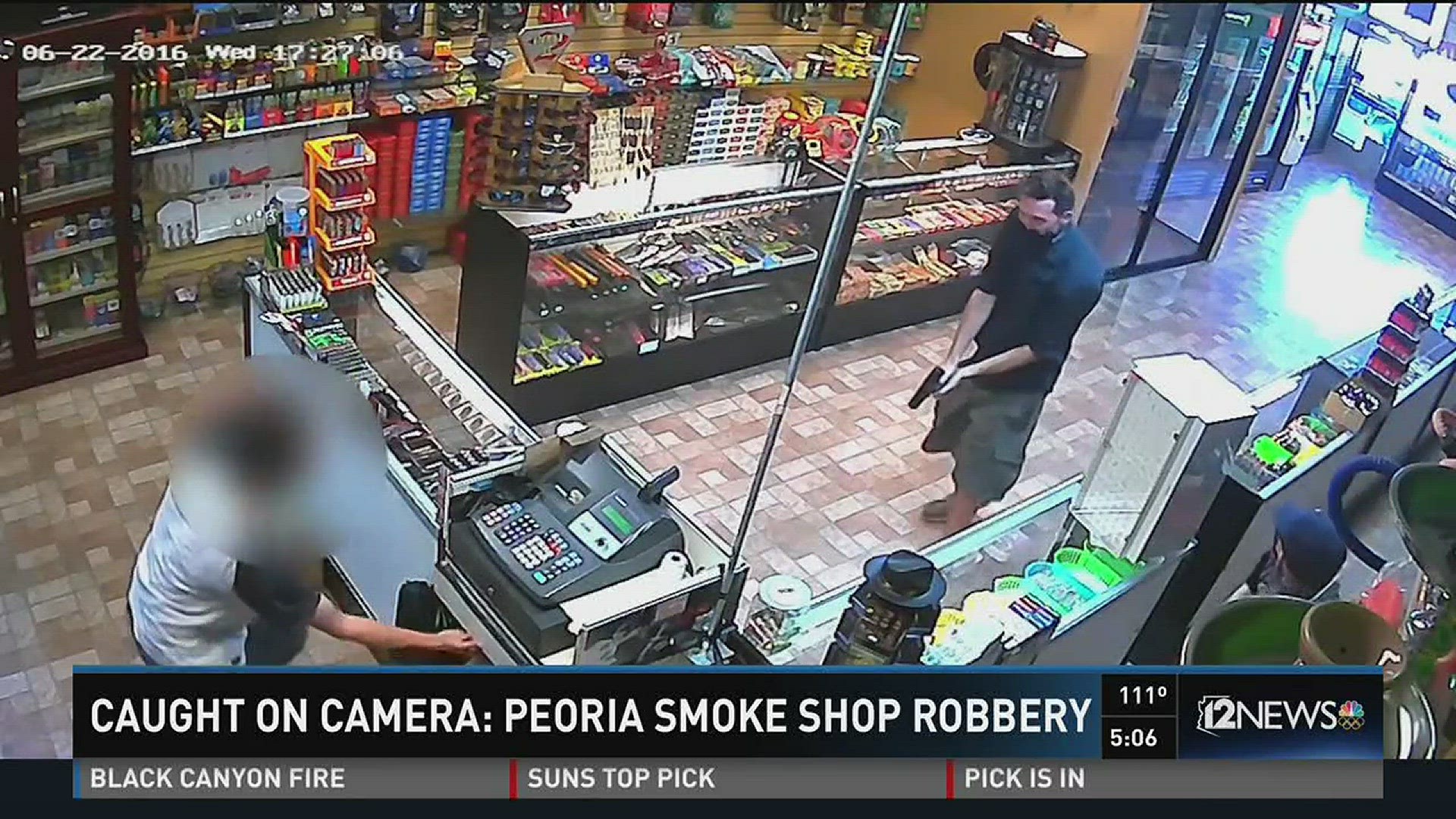 Police working to identify smoke shop robbery suspects