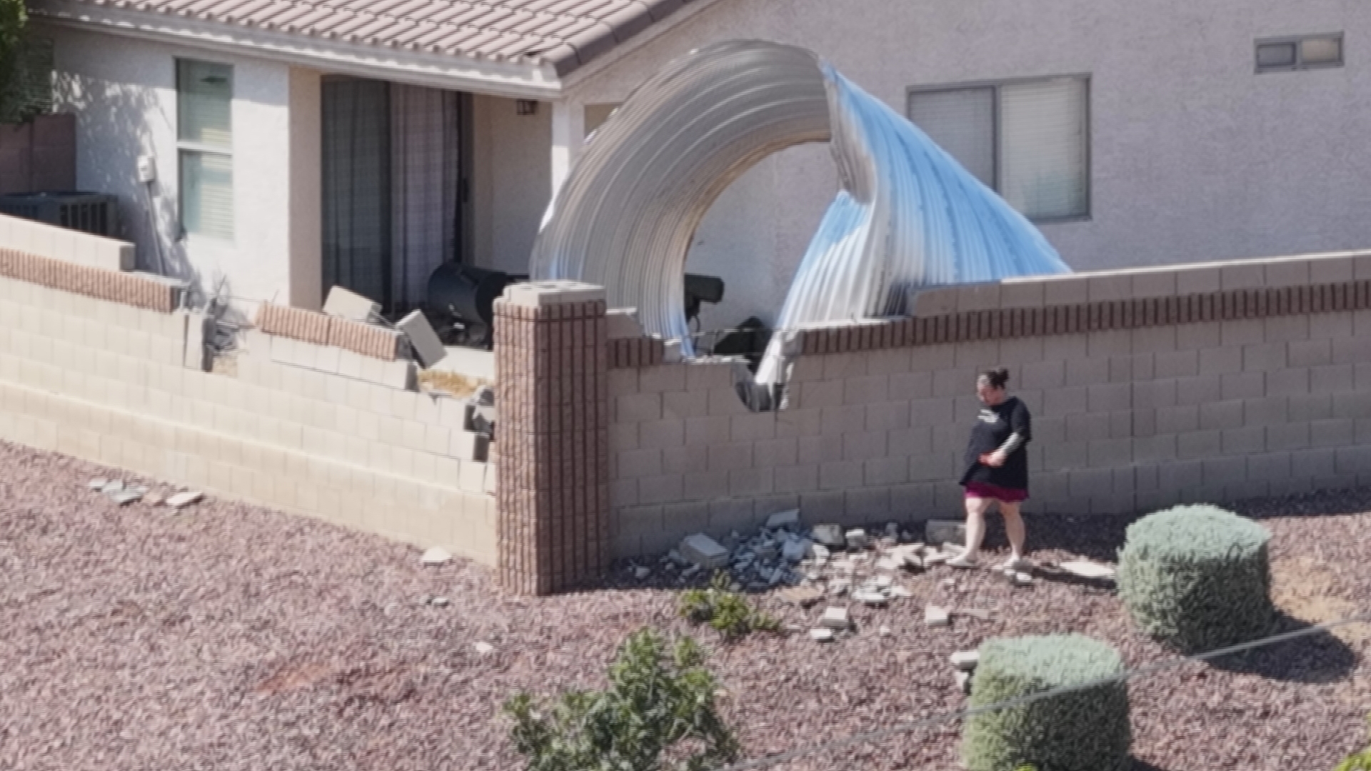 “You can’t even move these” — residents near El Mirage and Indian School roads brace for more storms.