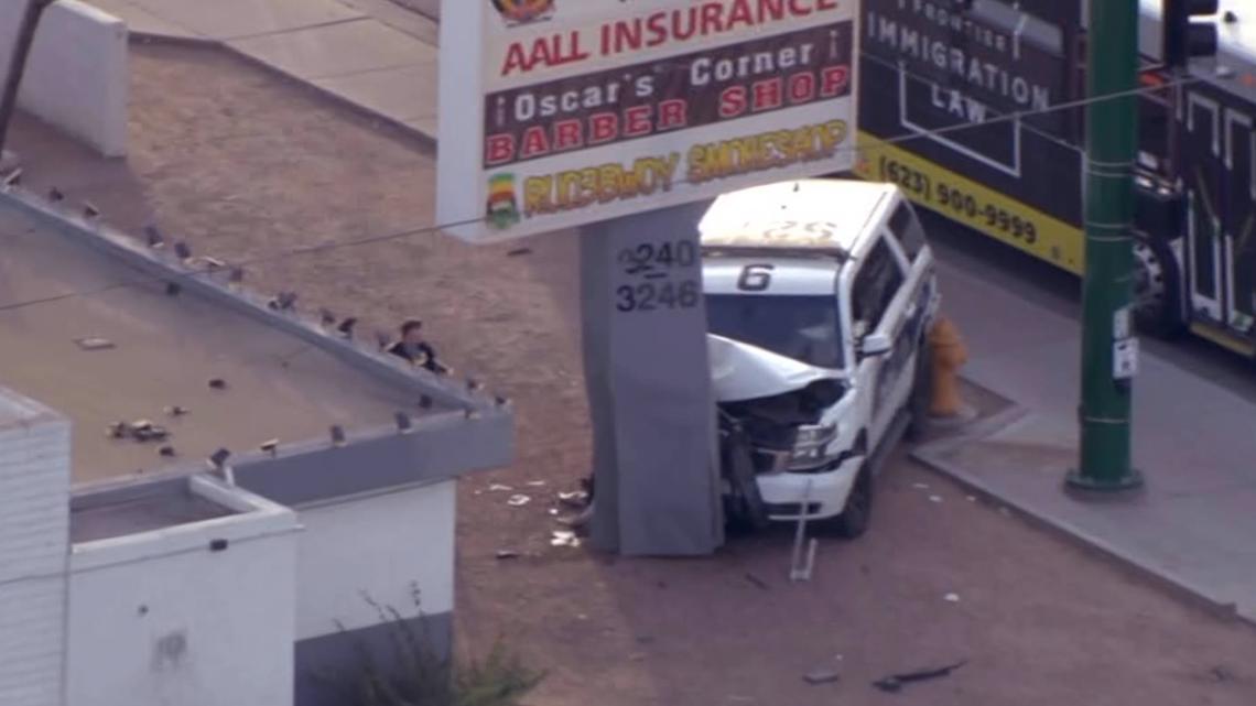 Phoenix police car crashes into sign, officer taken to hospital