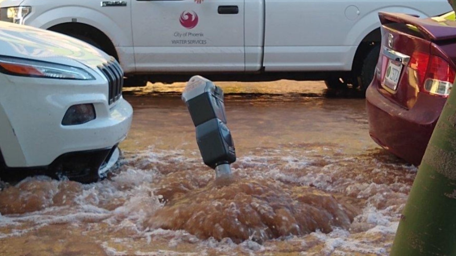 Water flooding onto downtwon Phoenix roadway