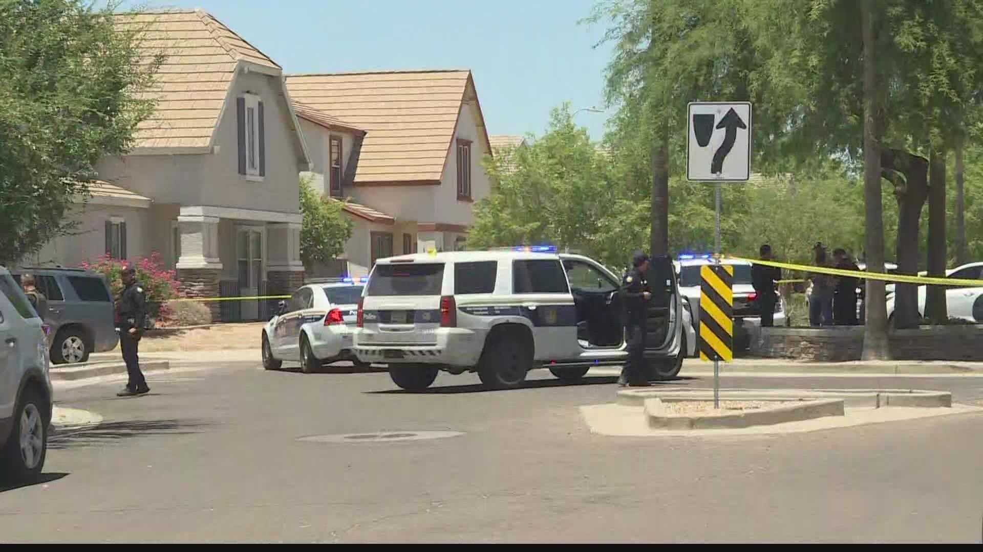 Authorities say at least two people have been detained after a Phoenix police officer was shot and wounded in Laveen Tuesday.