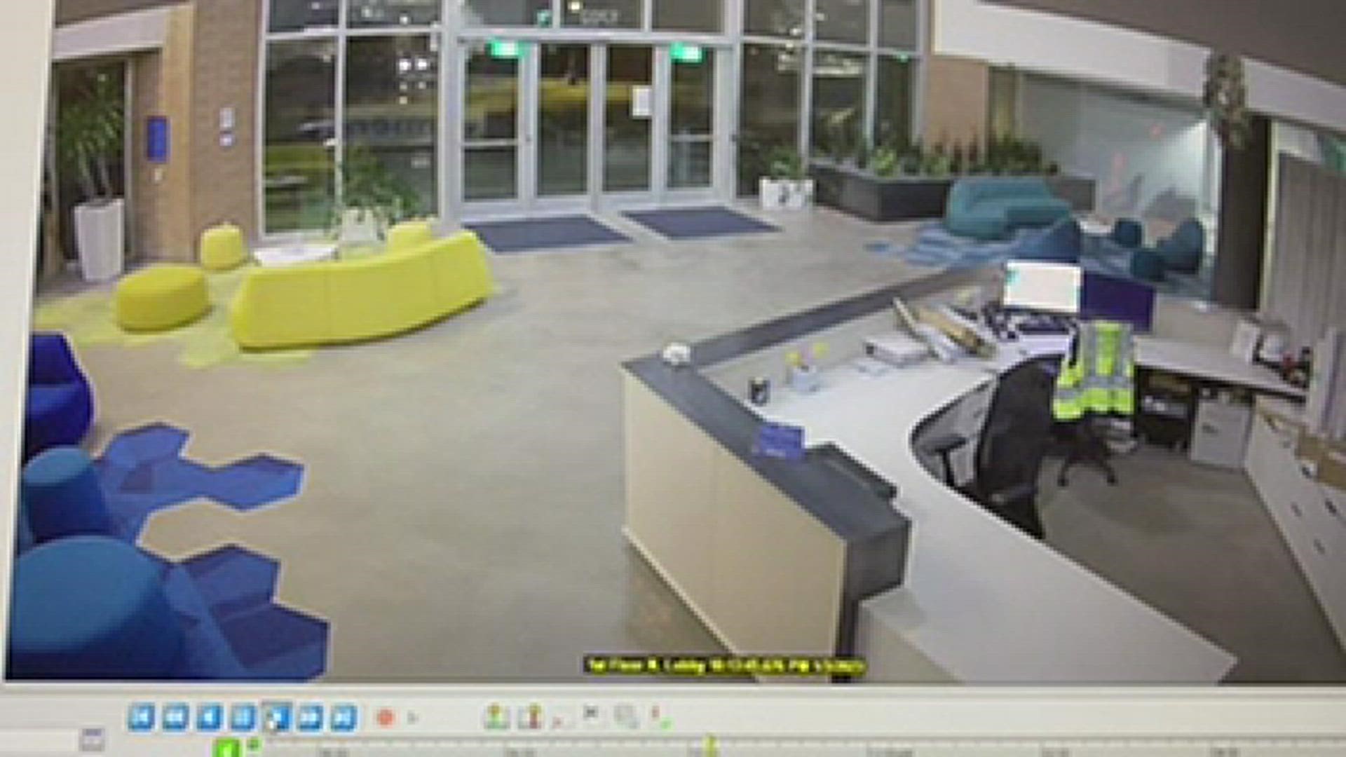Video surveillance shows a car pulling up to the Make-a-Wish America office in Phoenix on Tuesday.